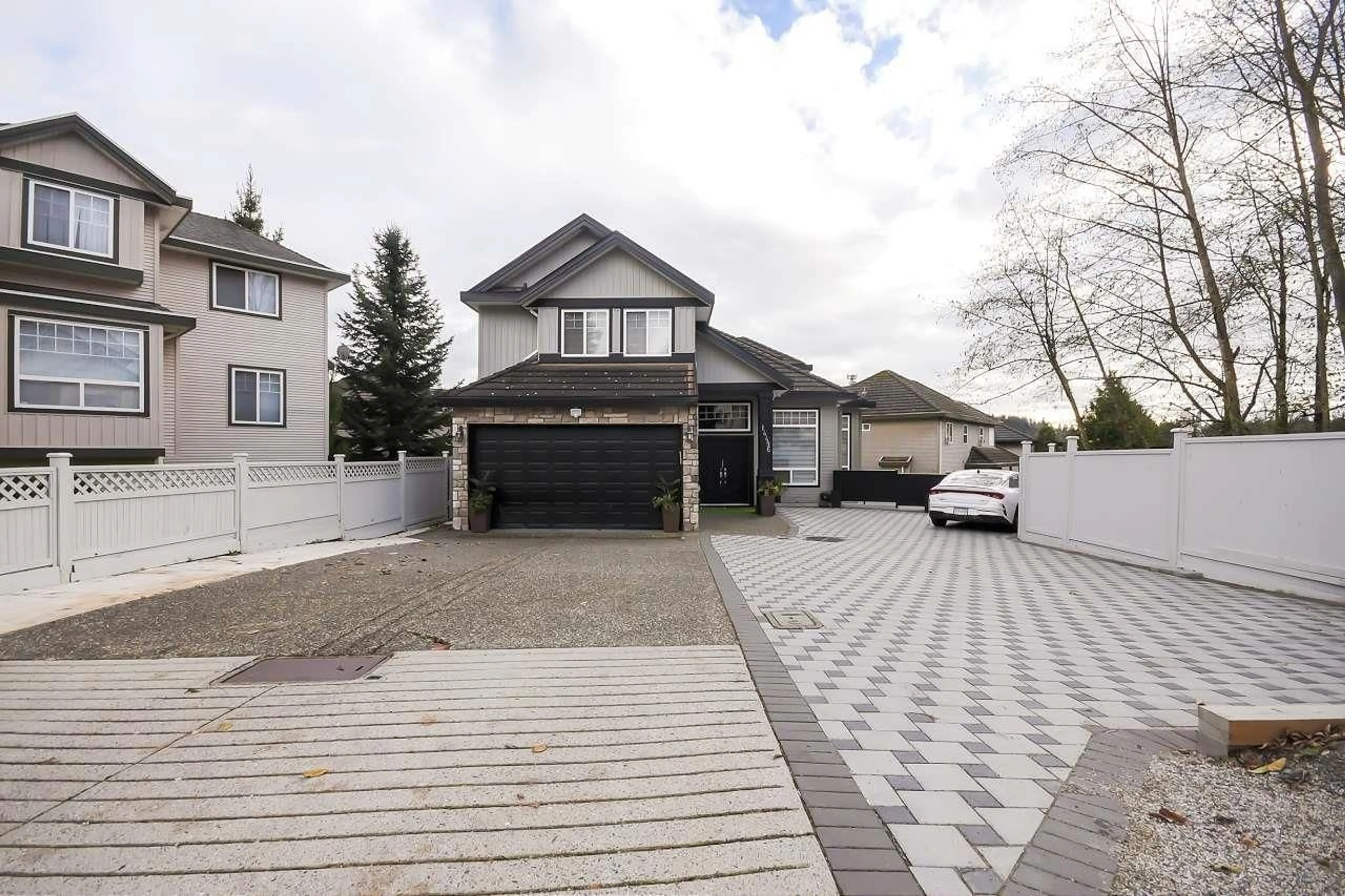 A pic from outside/outdoor area/front of a property/back of a property/a pic from drone, street for 14496 67B, Surrey British Columbia V3S0T3