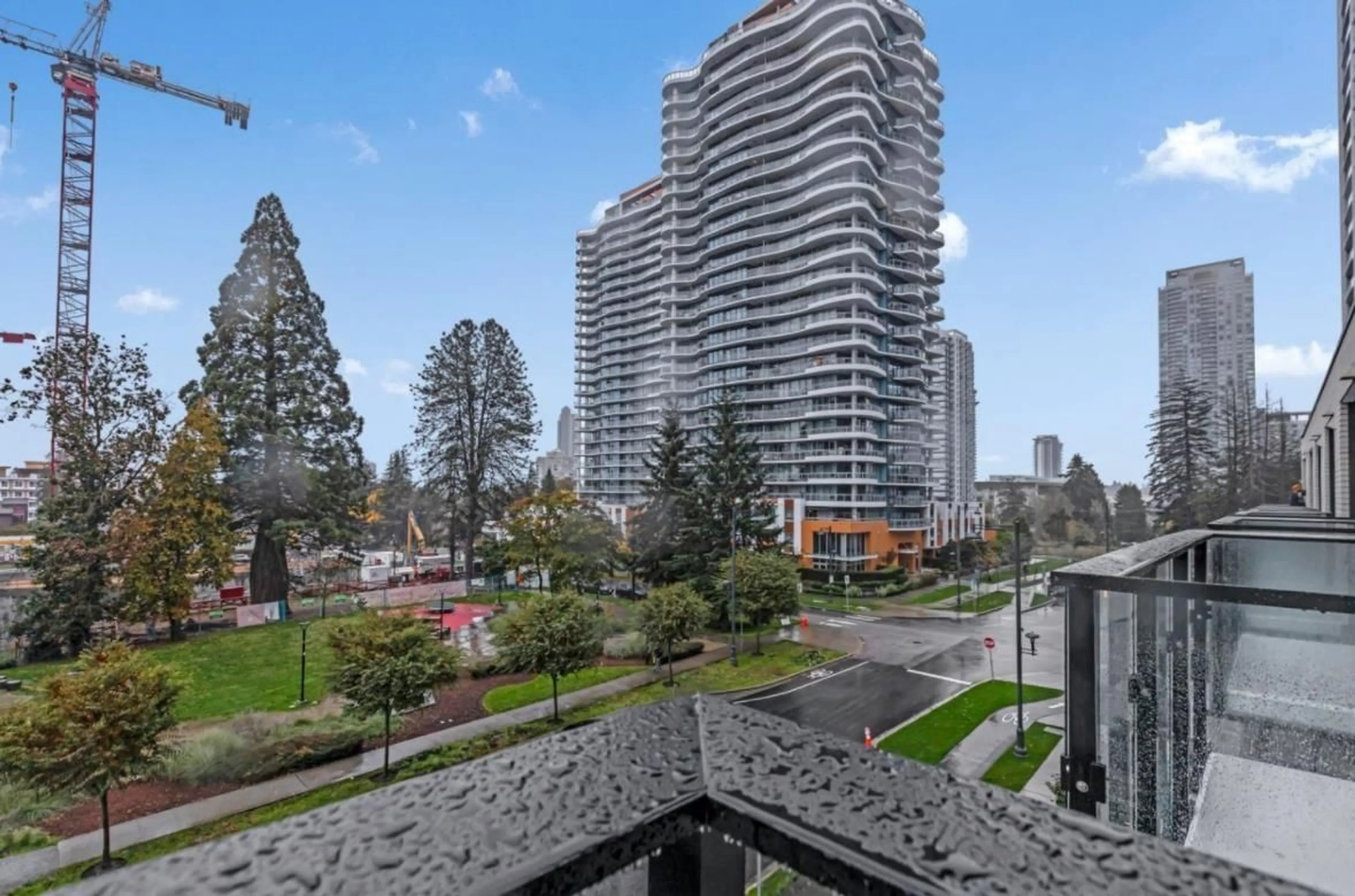 A pic from exterior of the house or condo, the view of city buildings for 313 10333 133 STREET, Surrey British Columbia V3R2H4