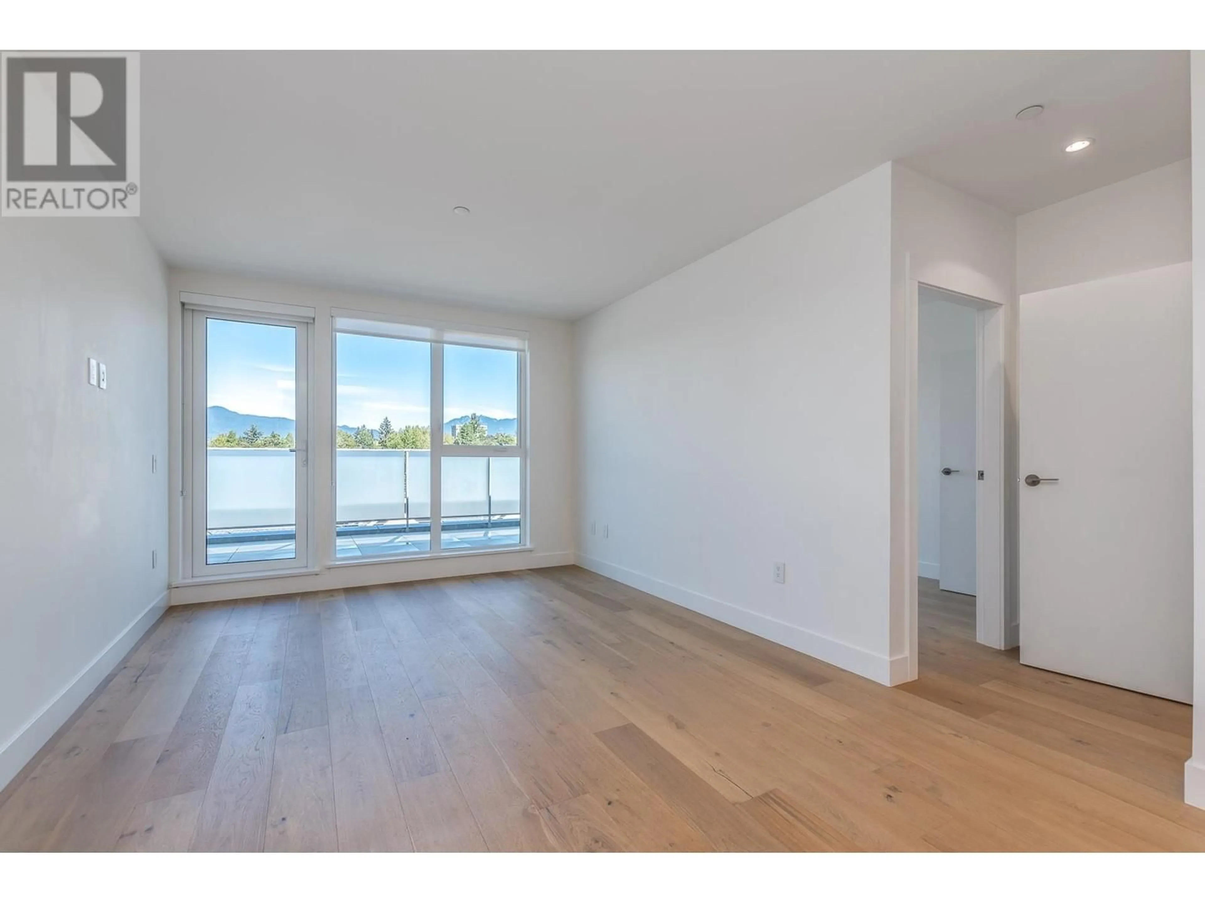 A pic of a room, wood floors for 404 2485 LARCH STREET, Vancouver British Columbia V6K0A3