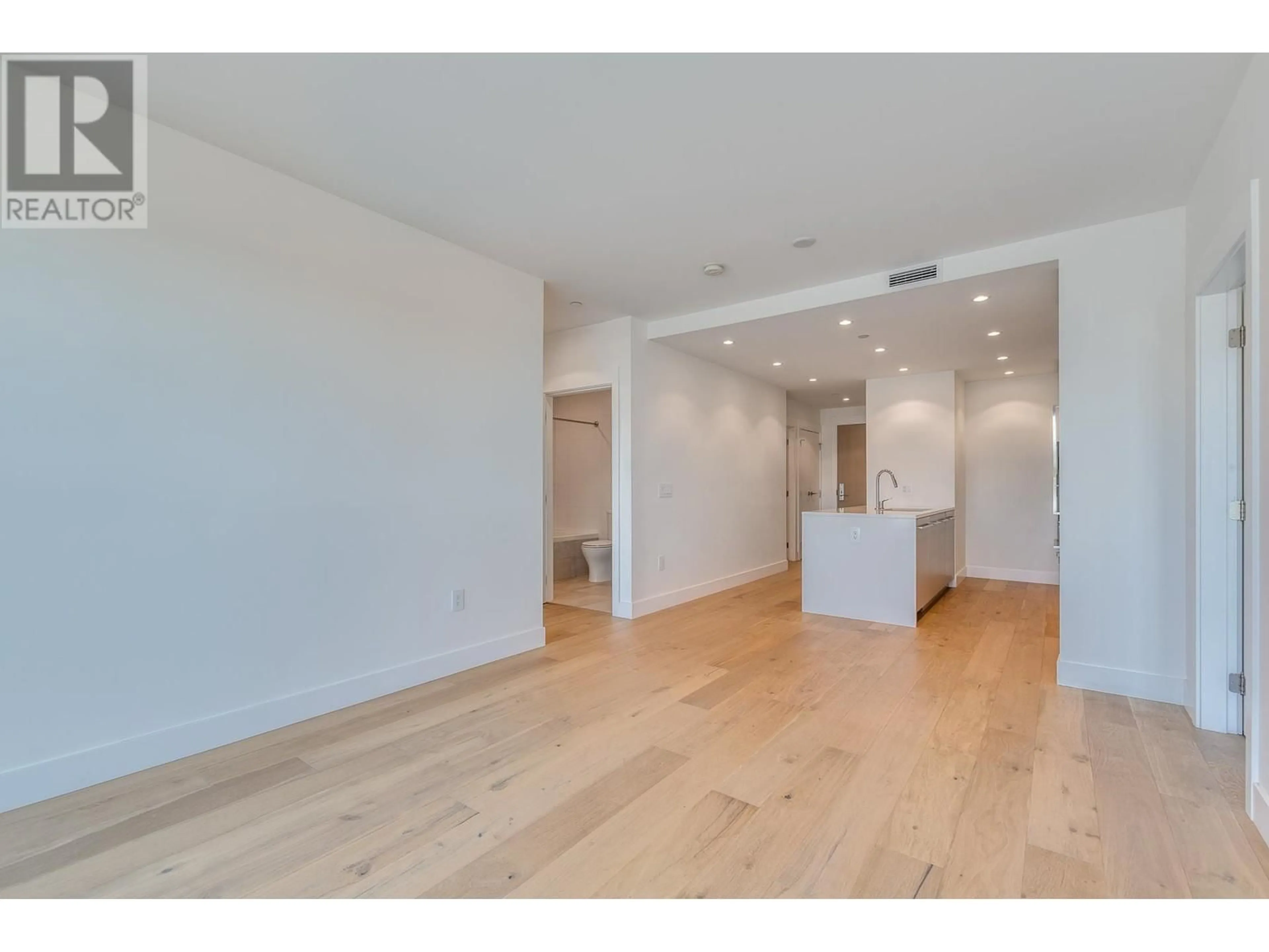 A pic of a room, wood floors for 404 2485 LARCH STREET, Vancouver British Columbia V6K0A3