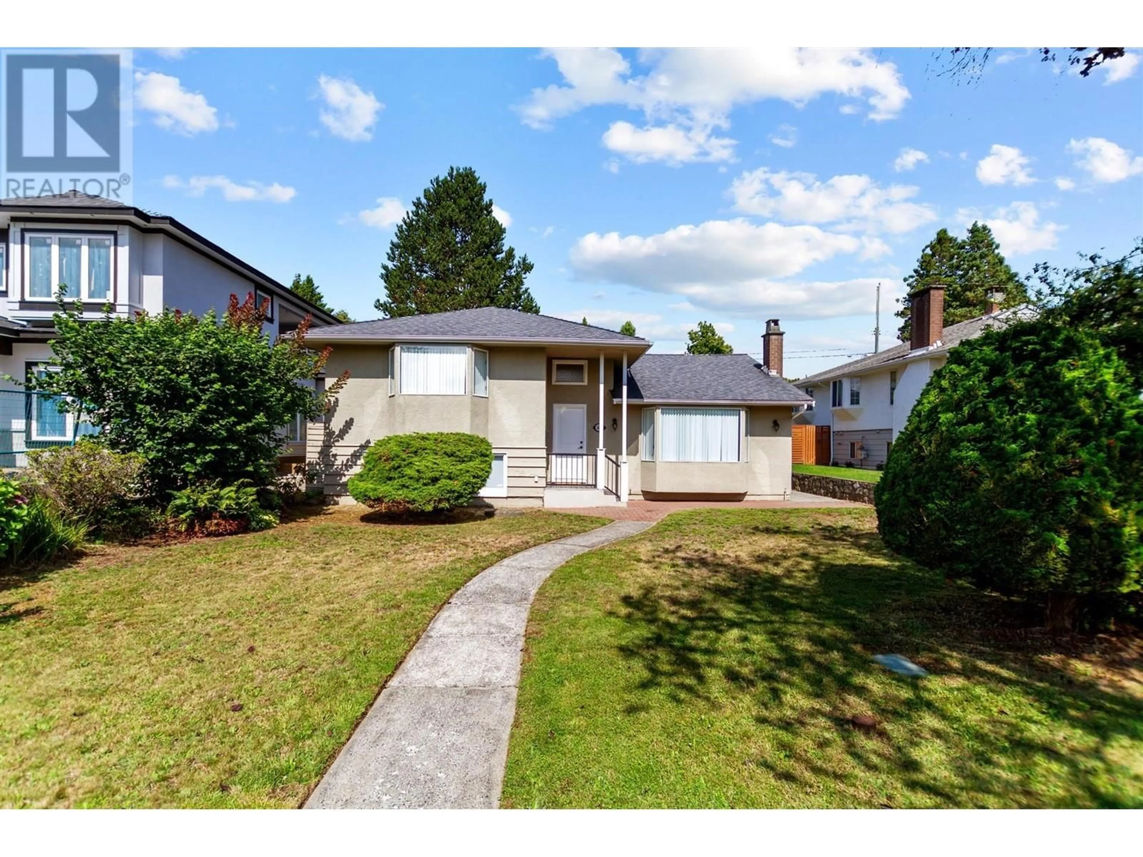 Frontside or backside of a home, the fenced backyard for 4823 WESTLAWN DRIVE, Burnaby British Columbia V5C3R4