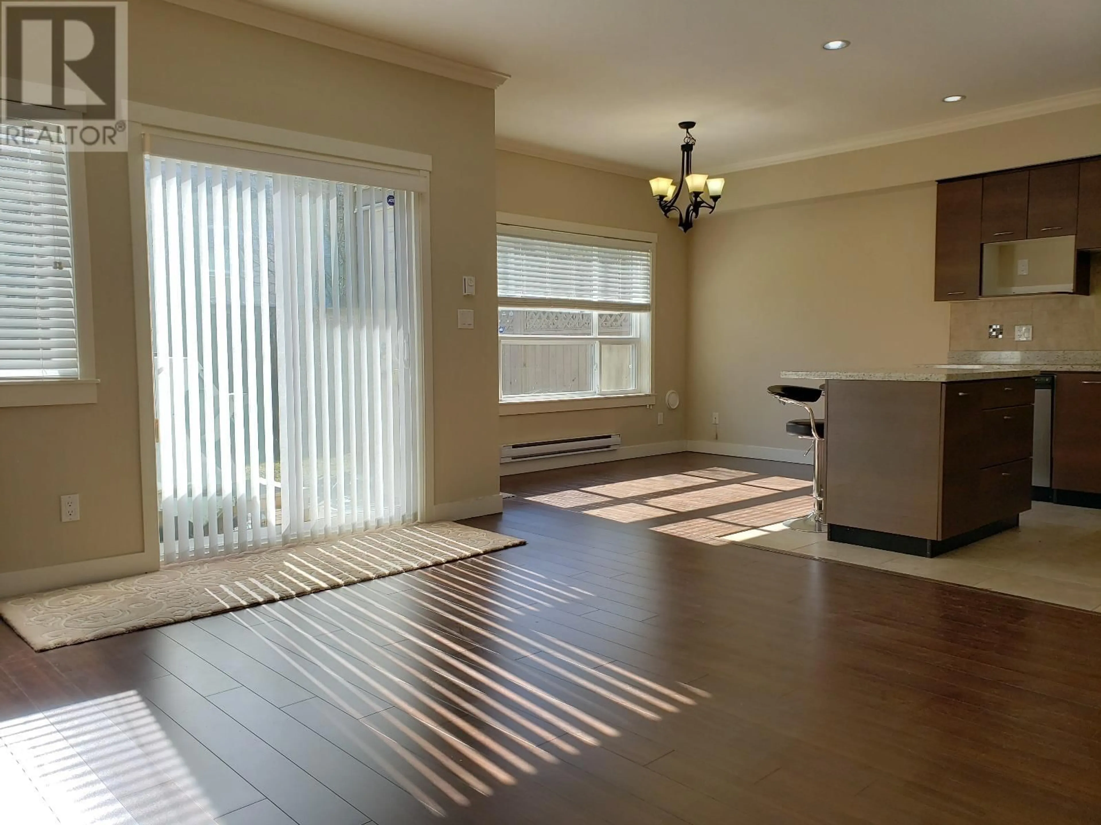 A pic of a room, wood floors for 14 5580 MONCTON STREET, Richmond British Columbia V7E3B4