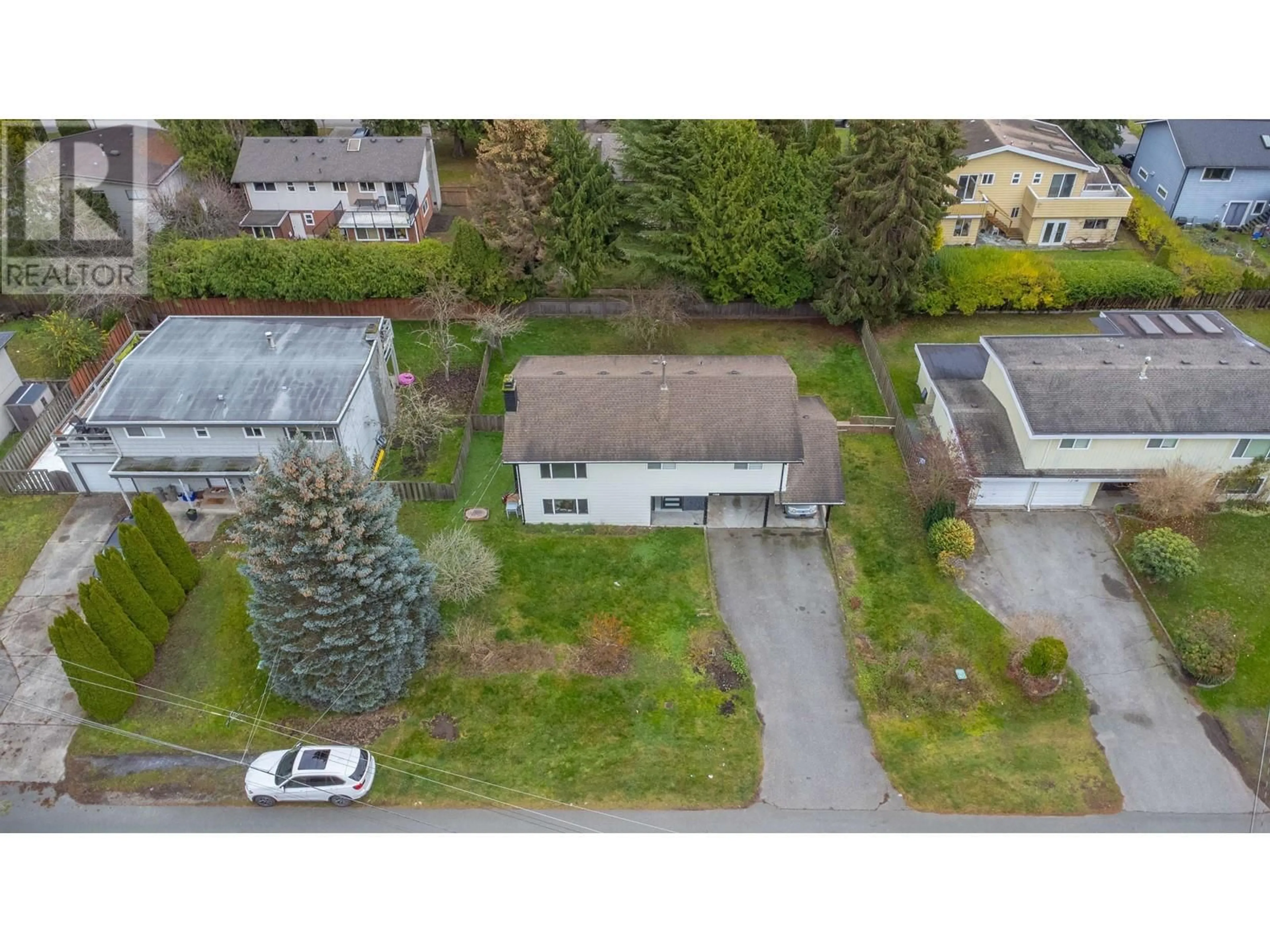 Frontside or backside of a home, the street view for 1752 55 STREET, Delta British Columbia V4M3K8