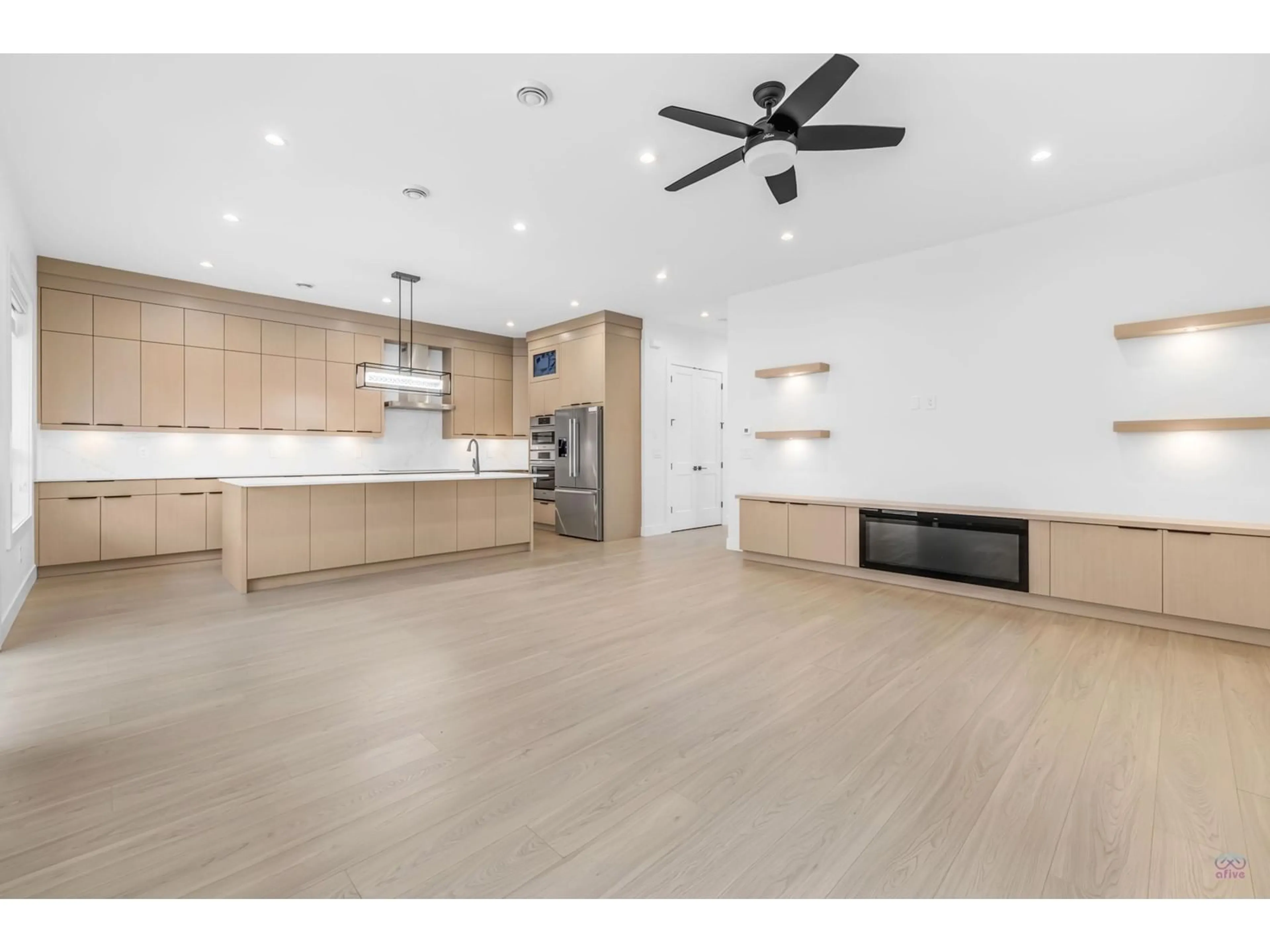 Open concept kitchen, wood/laminate floor for 5517 184, Surrey British Columbia V3S1E1