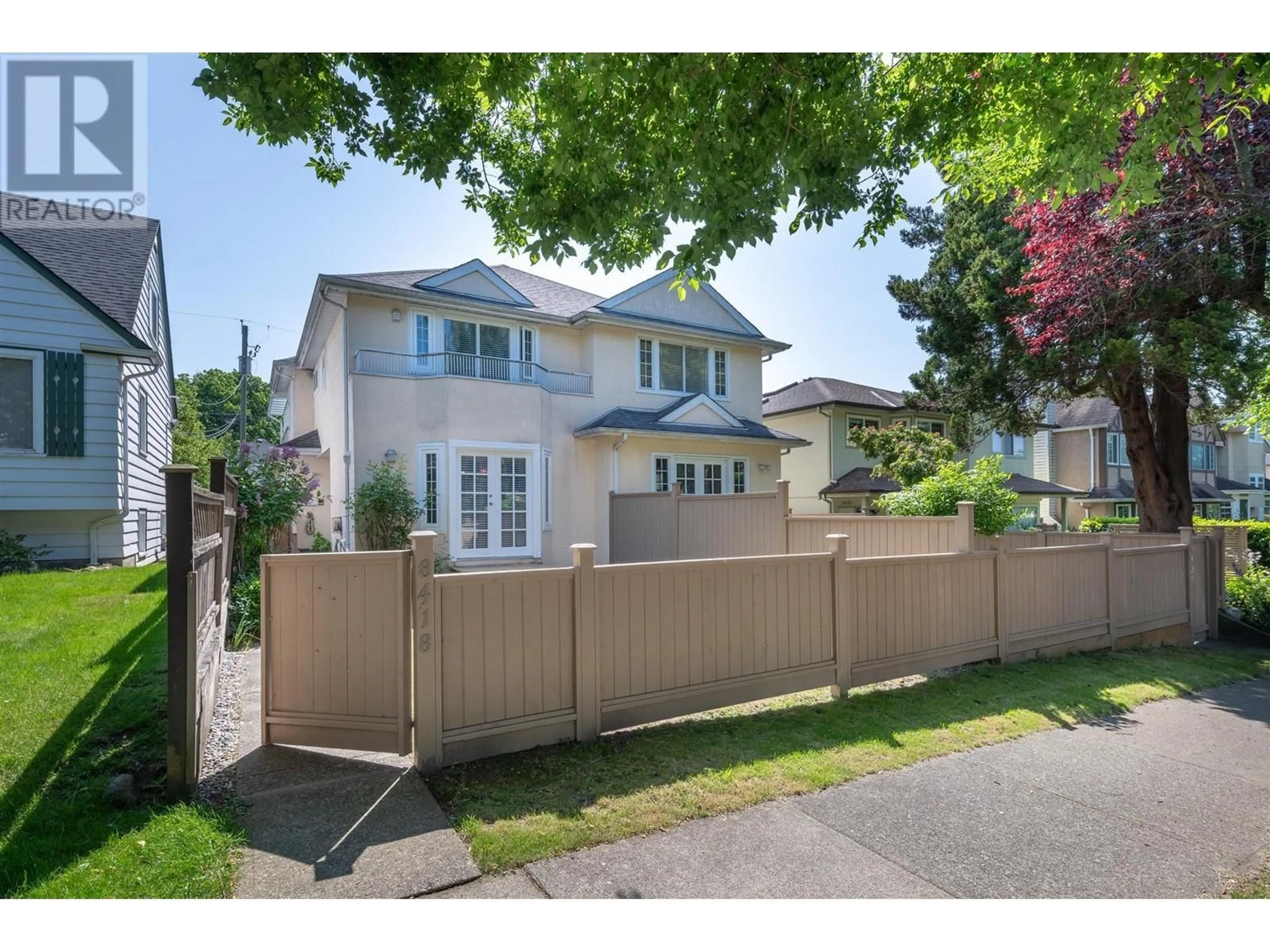 Frontside or backside of a home, the fenced backyard for 8418 FRENCH STREET, Vancouver British Columbia V6P4W2