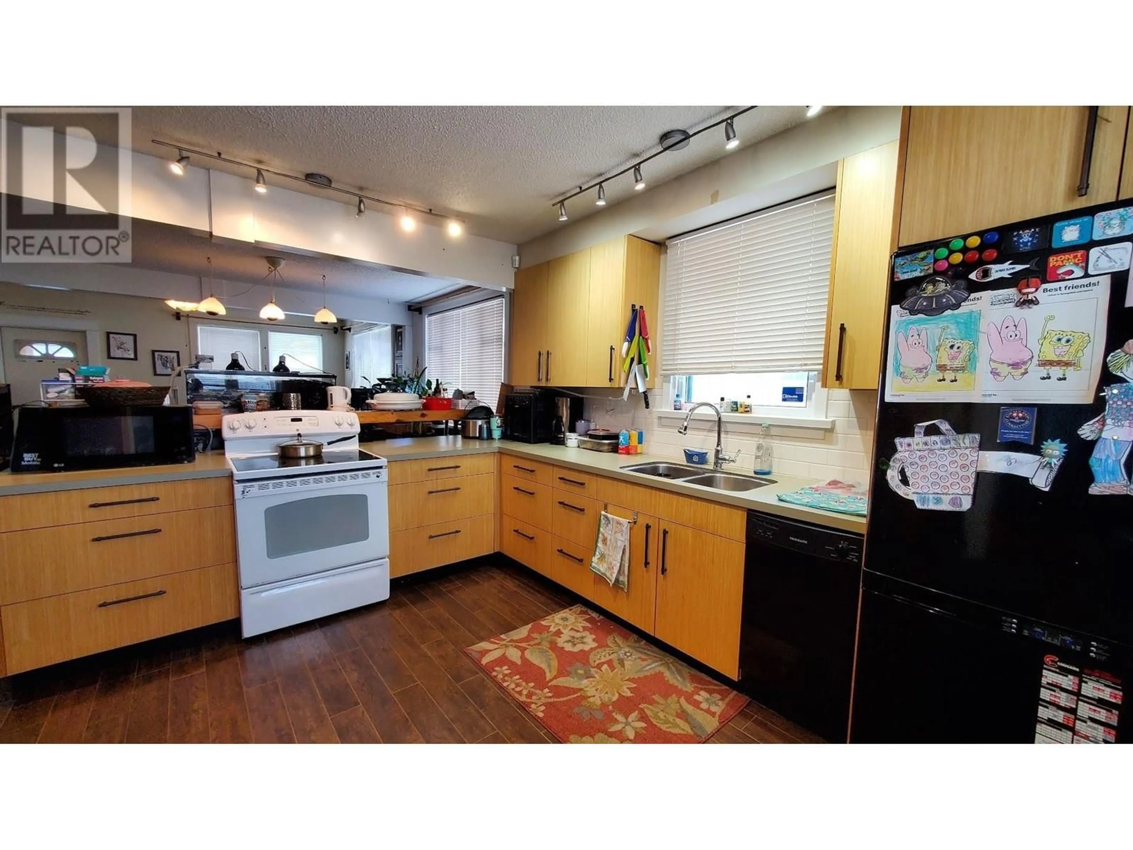 Kitchen, wood floors for 2021 SPRUCE STREET, Prince George British Columbia V2L2R7