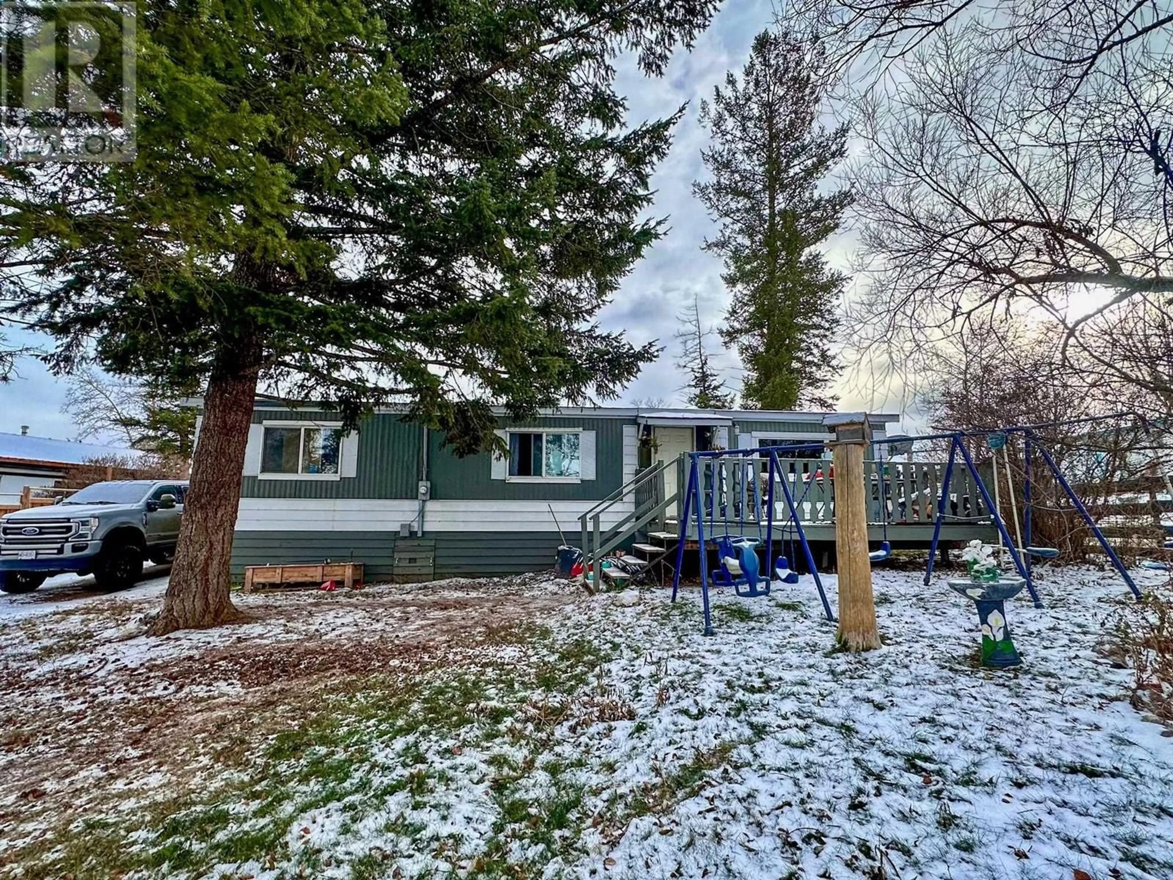 A pic from outside/outdoor area/front of a property/back of a property/a pic from drone, unknown for 5586 103 MILE LAKE ROAD, 103 Mile House British Columbia V0K2E1