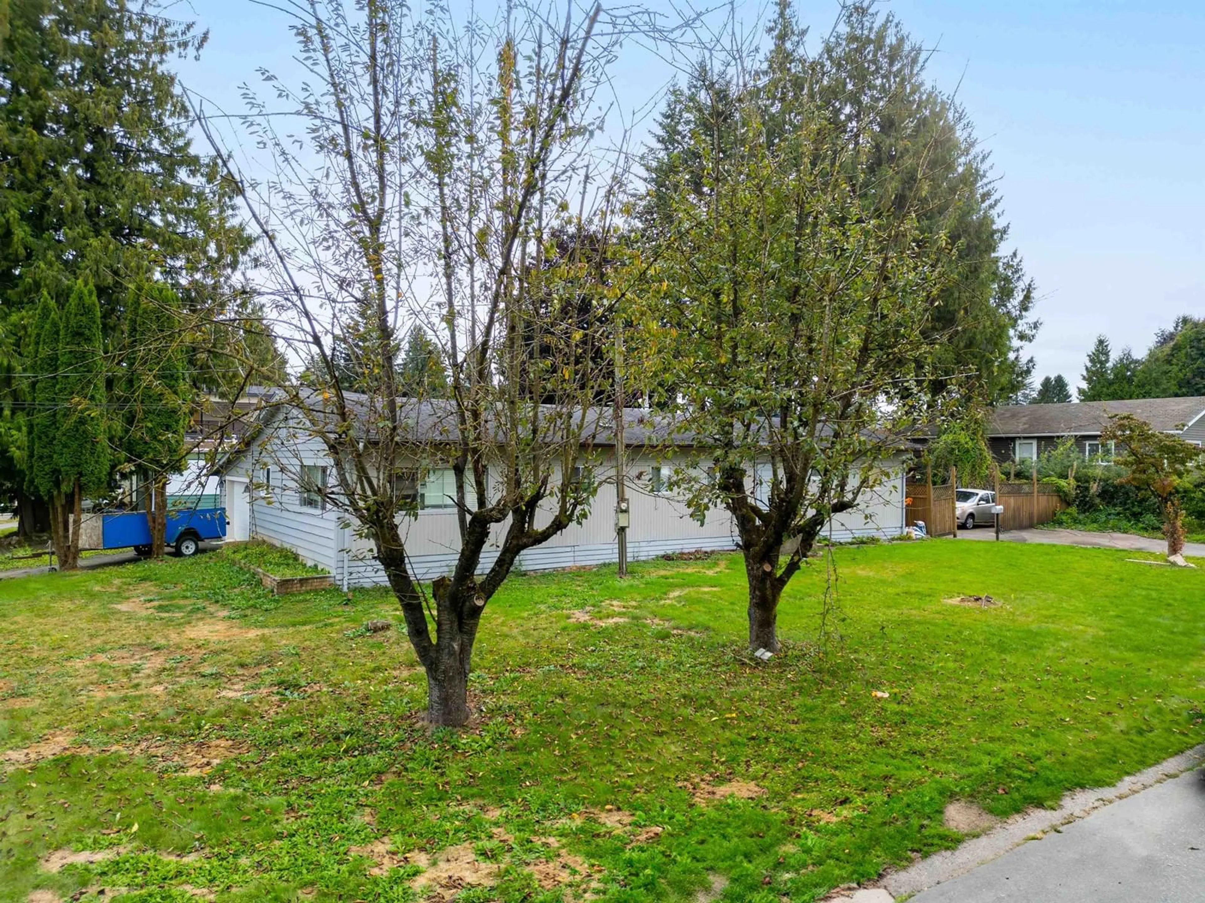 Frontside or backside of a home, the fenced backyard for 2171 OAKRIDGE CRESCENT, Abbotsford British Columbia V2T6A8