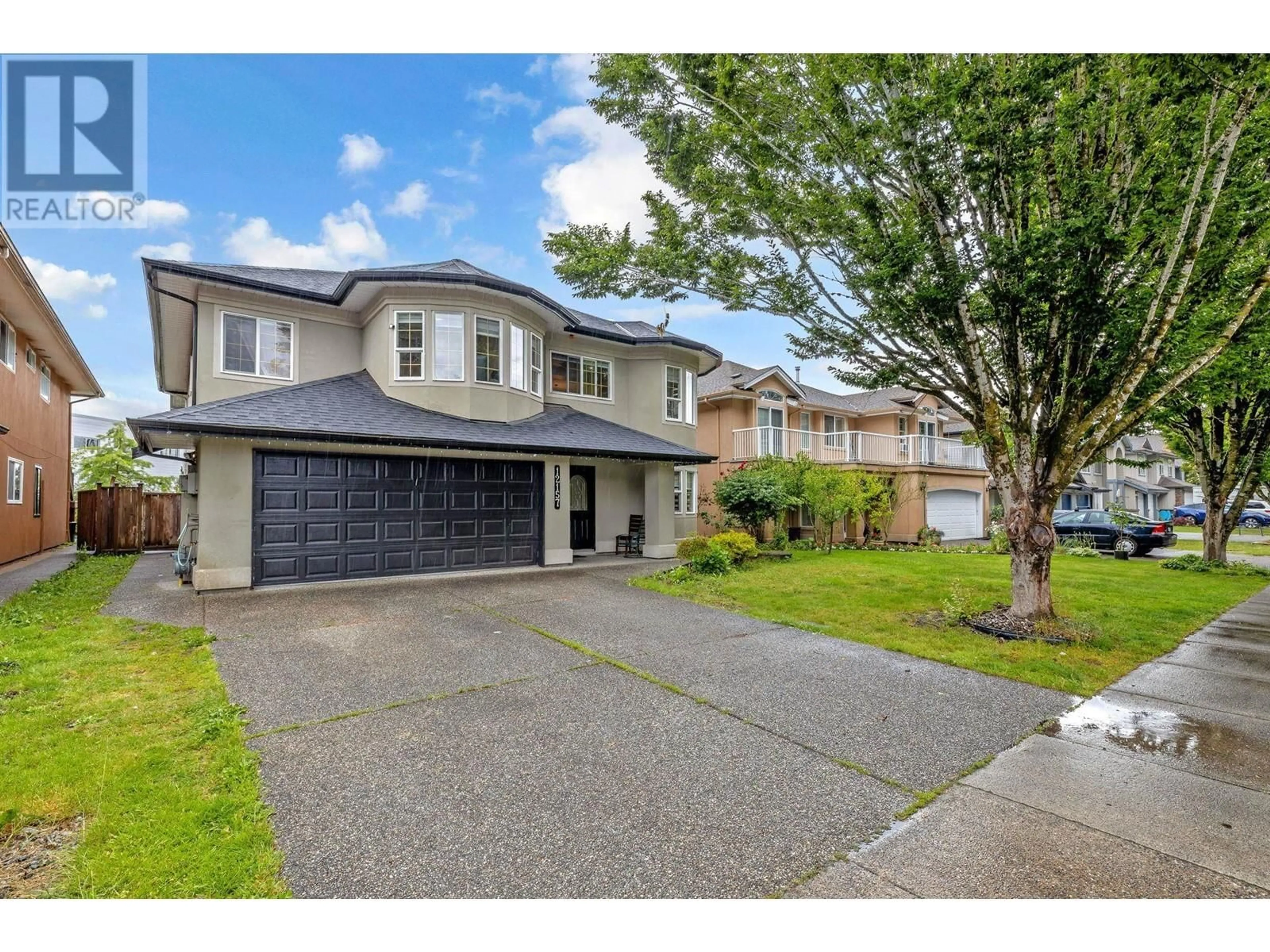 Frontside or backside of a home, the street view for 12157 201 STREET, Maple Ridge British Columbia V2X3M4