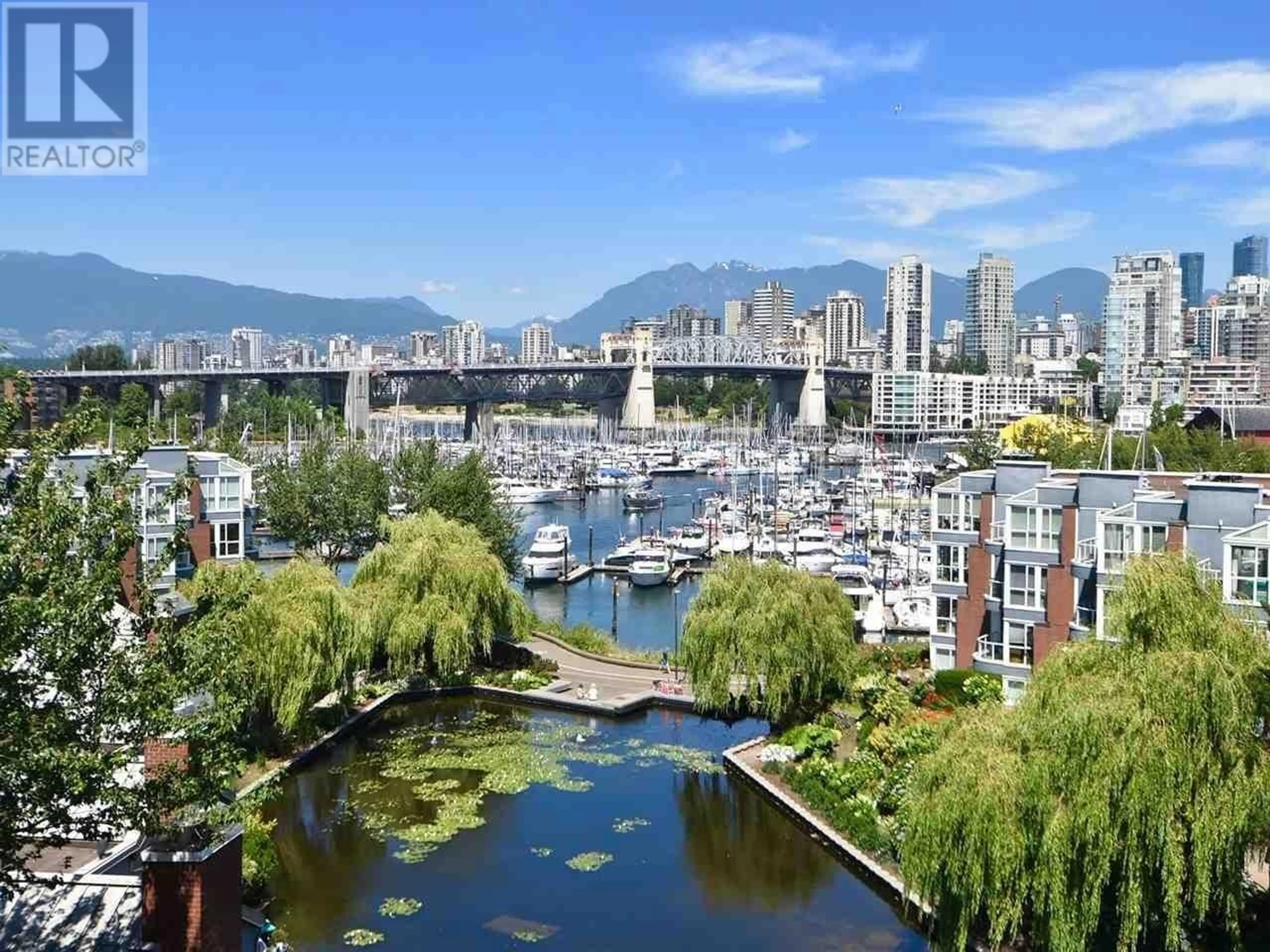 A pic from exterior of the house or condo, the view of city buildings for 535 1515 W 2ND AVENUE, Vancouver British Columbia V6J5C5