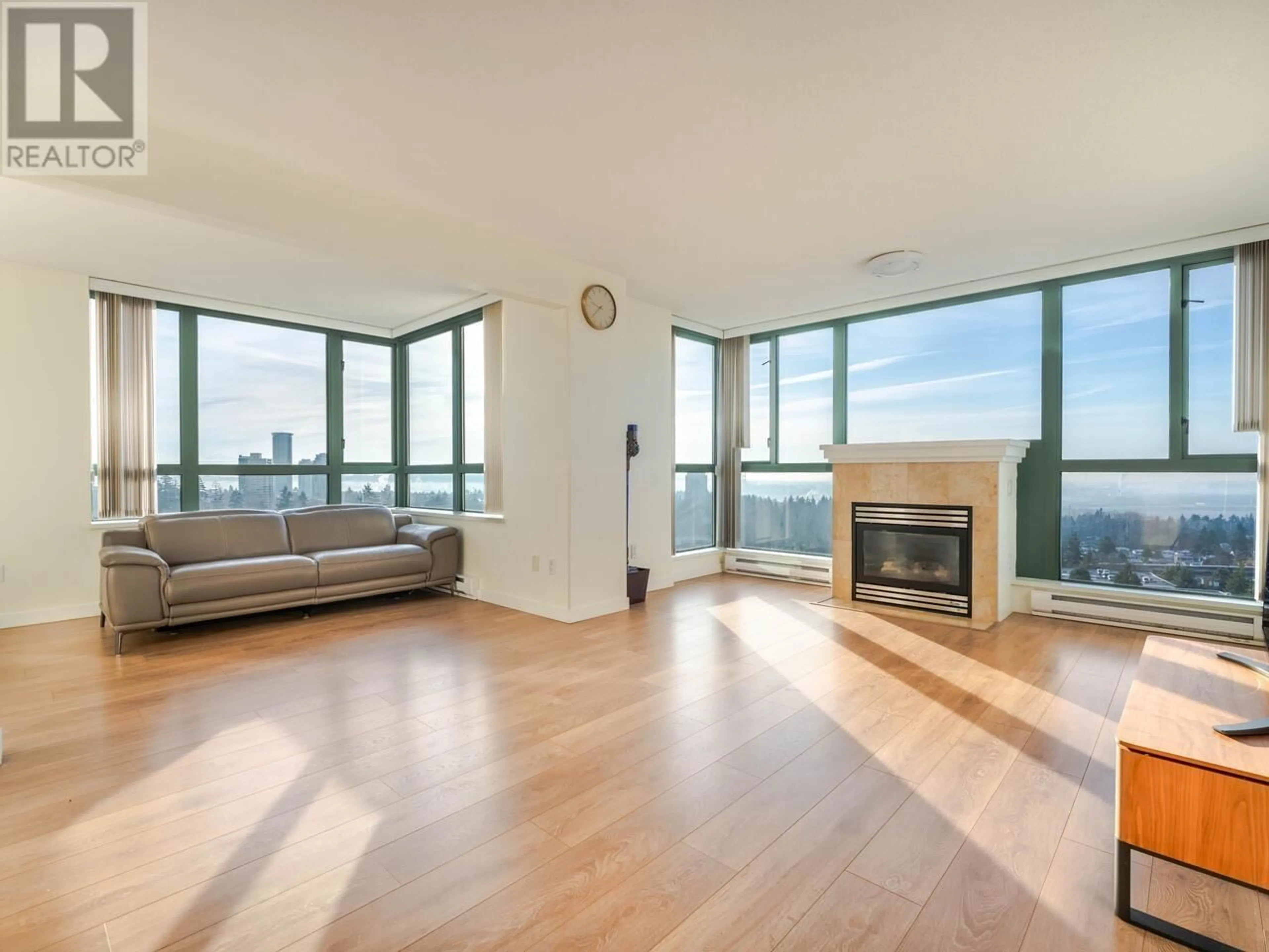 Living room with furniture, wood/laminate floor for 1303 - 6659 SOUTHOAKS CRESCENT, Burnaby British Columbia V5E4M9