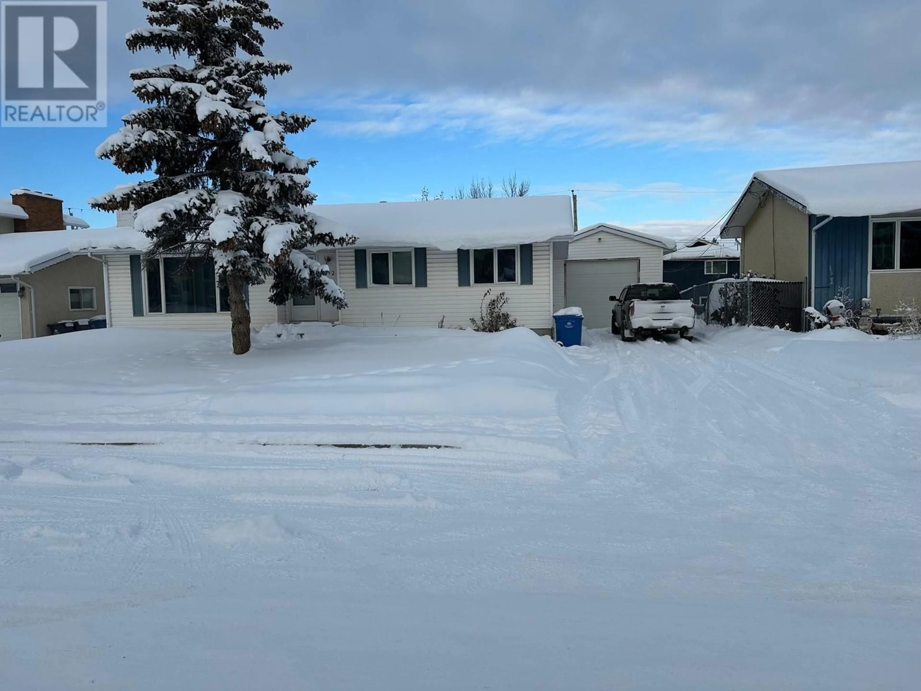 Frontside or backside of a home, the street view for 10412 112 AVENUE, Fort St. John British Columbia V1J2W7