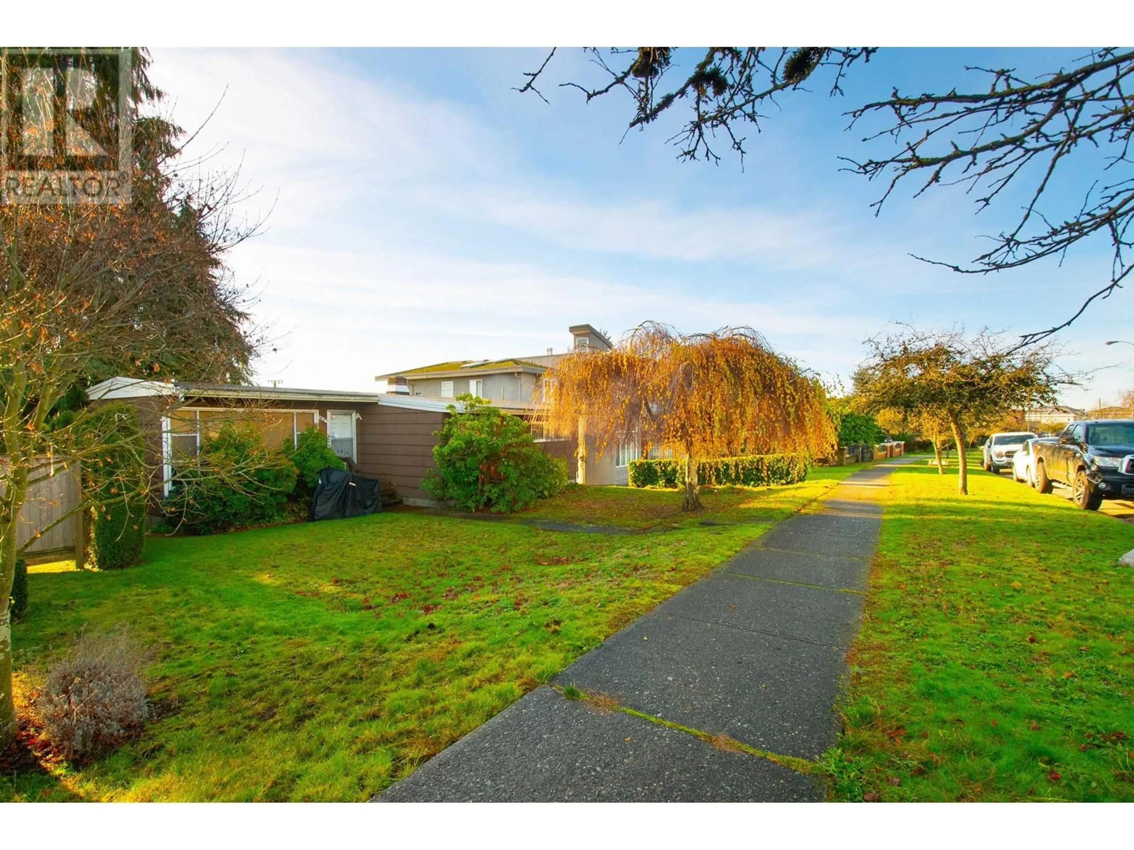 A pic from exterior of the house or condo, the fenced backyard for 2354 BURQUITLAM DRIVE, Vancouver British Columbia V5P2P1