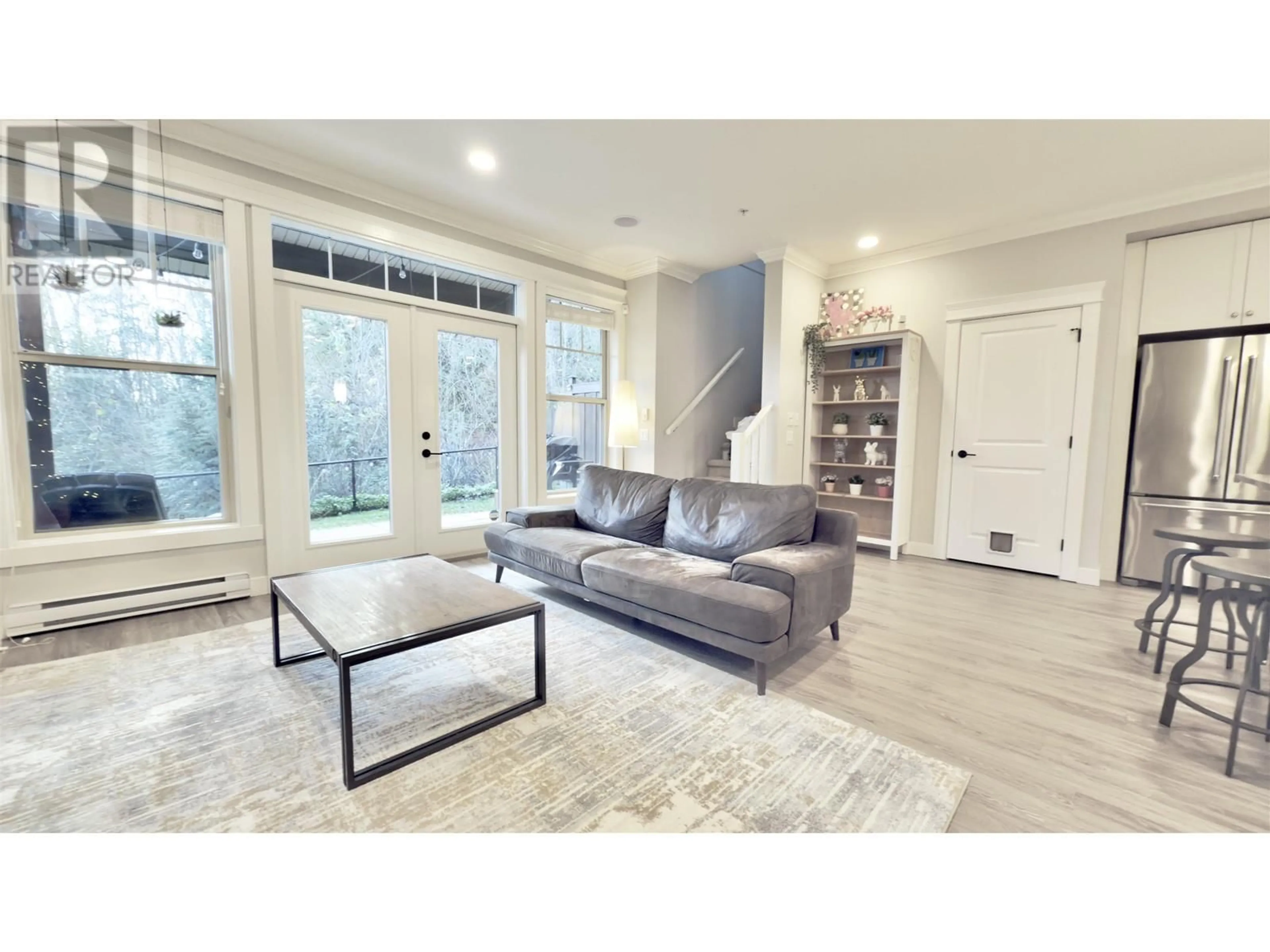 Living room, wood floors for 8 10525 240 STREET, Maple Ridge British Columbia V2W0J3