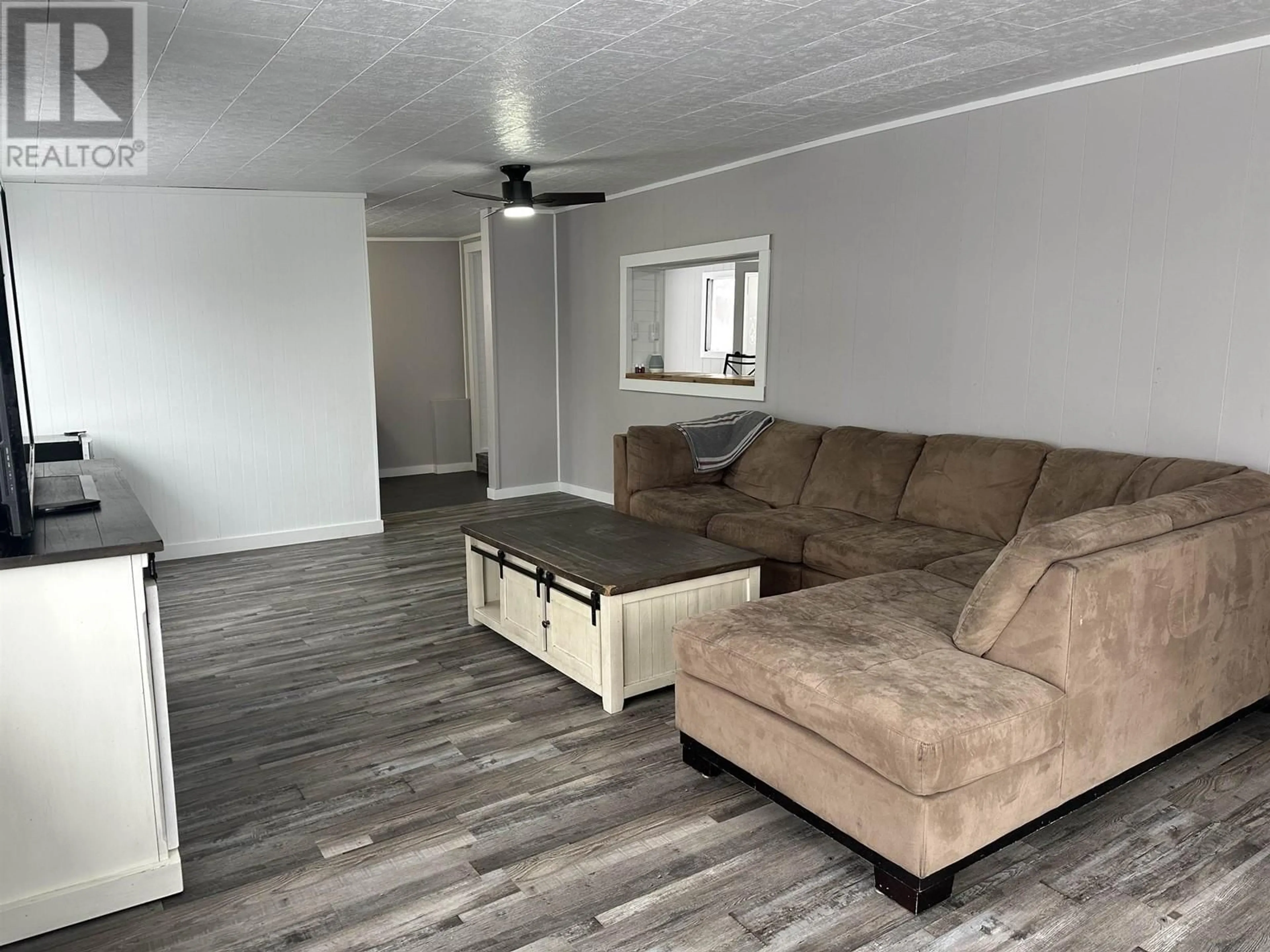 Living room, wood floors for 13239 CHARLIE LAKE CRESCENT, Charlie Lake British Columbia V1J8G1