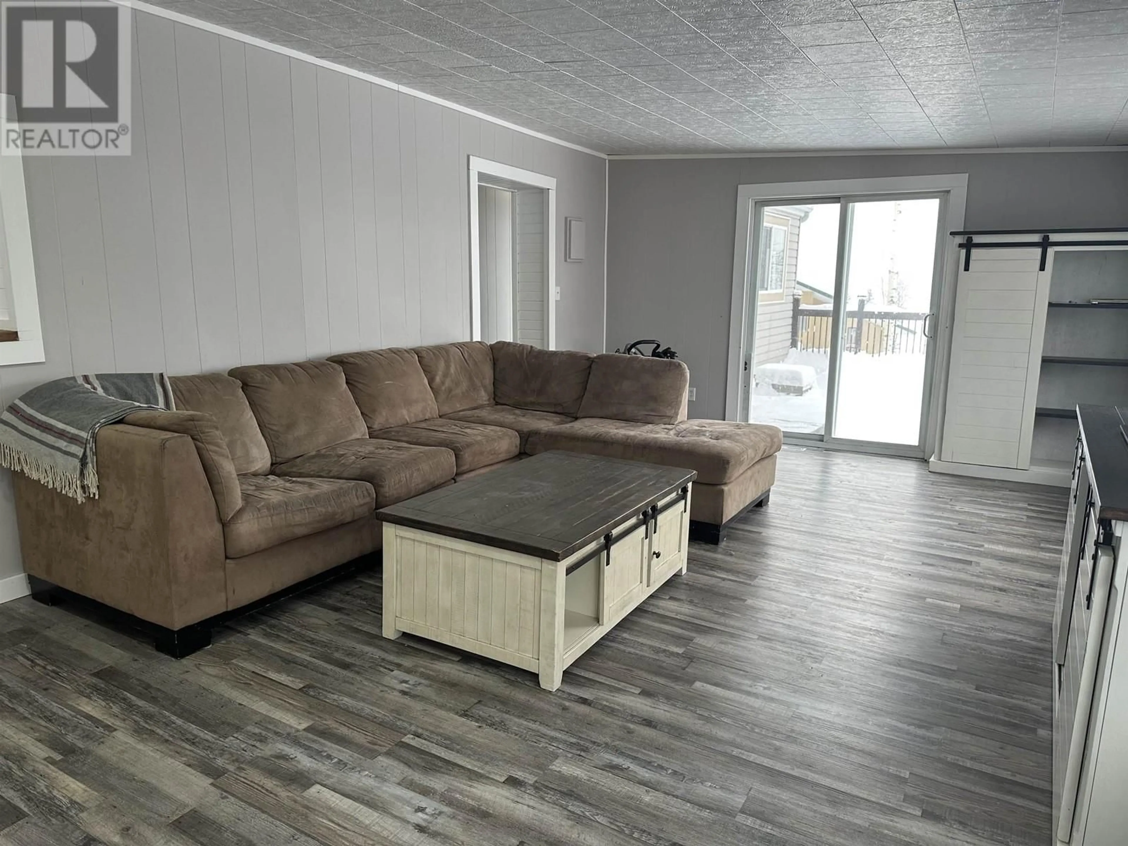 Living room, wood floors for 13239 CHARLIE LAKE CRESCENT, Charlie Lake British Columbia V1J8G1