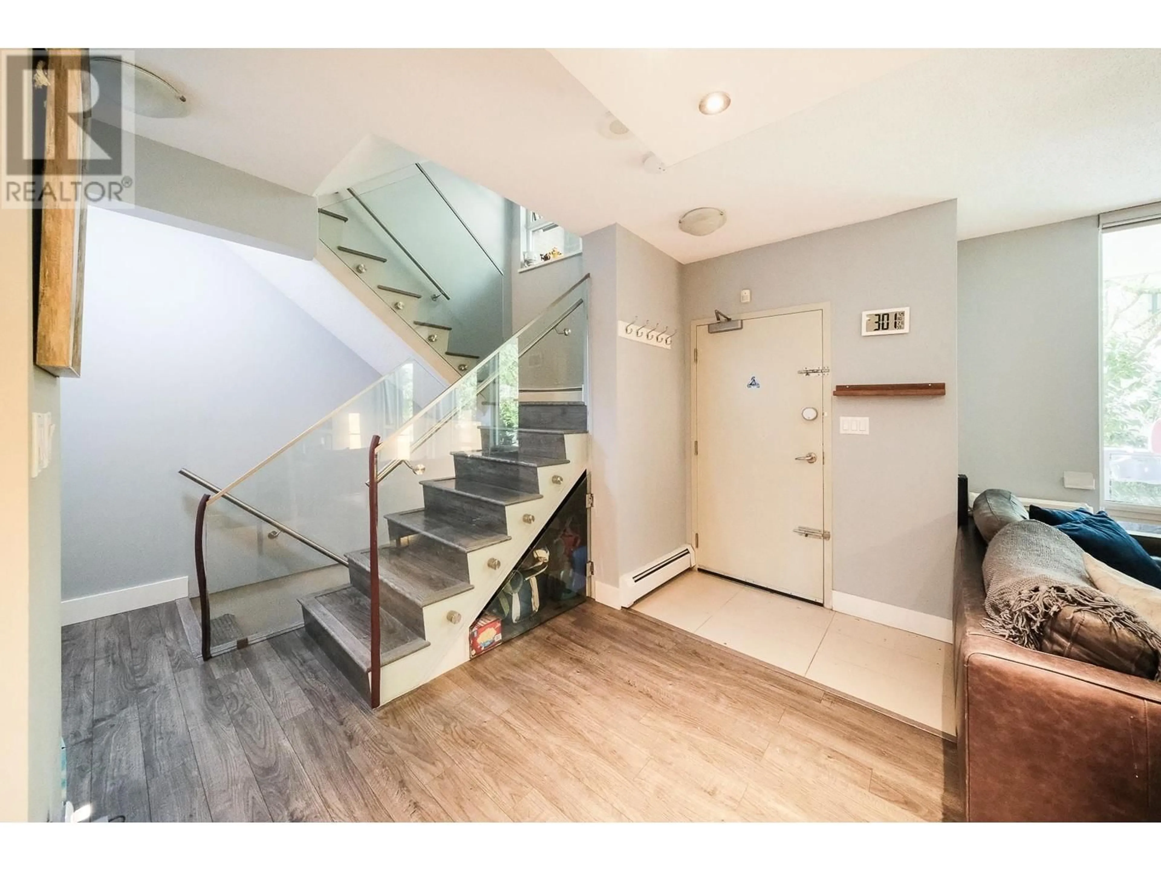 Indoor foyer, wood floors for 1021 EXPO BOULEVARD, Vancouver British Columbia V6Z2W1