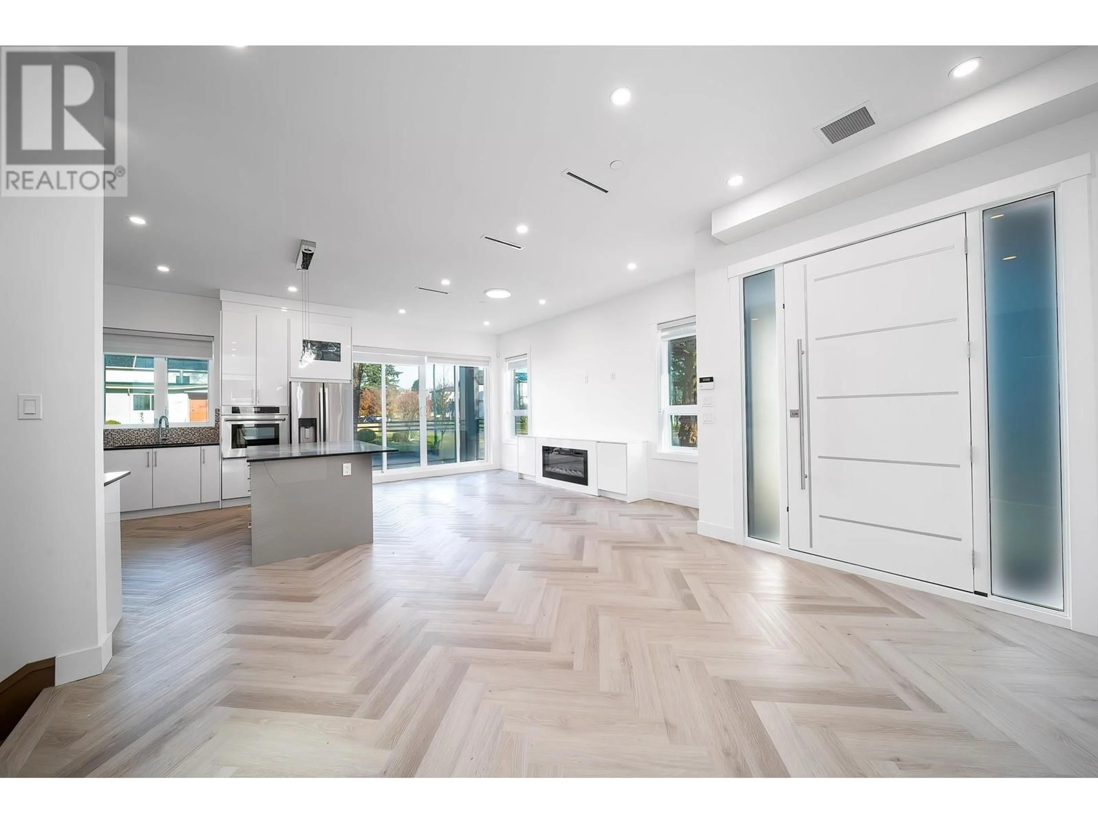 Indoor foyer, wood floors for 7033 INVERNESS STREET, Vancouver British Columbia V5X1L9