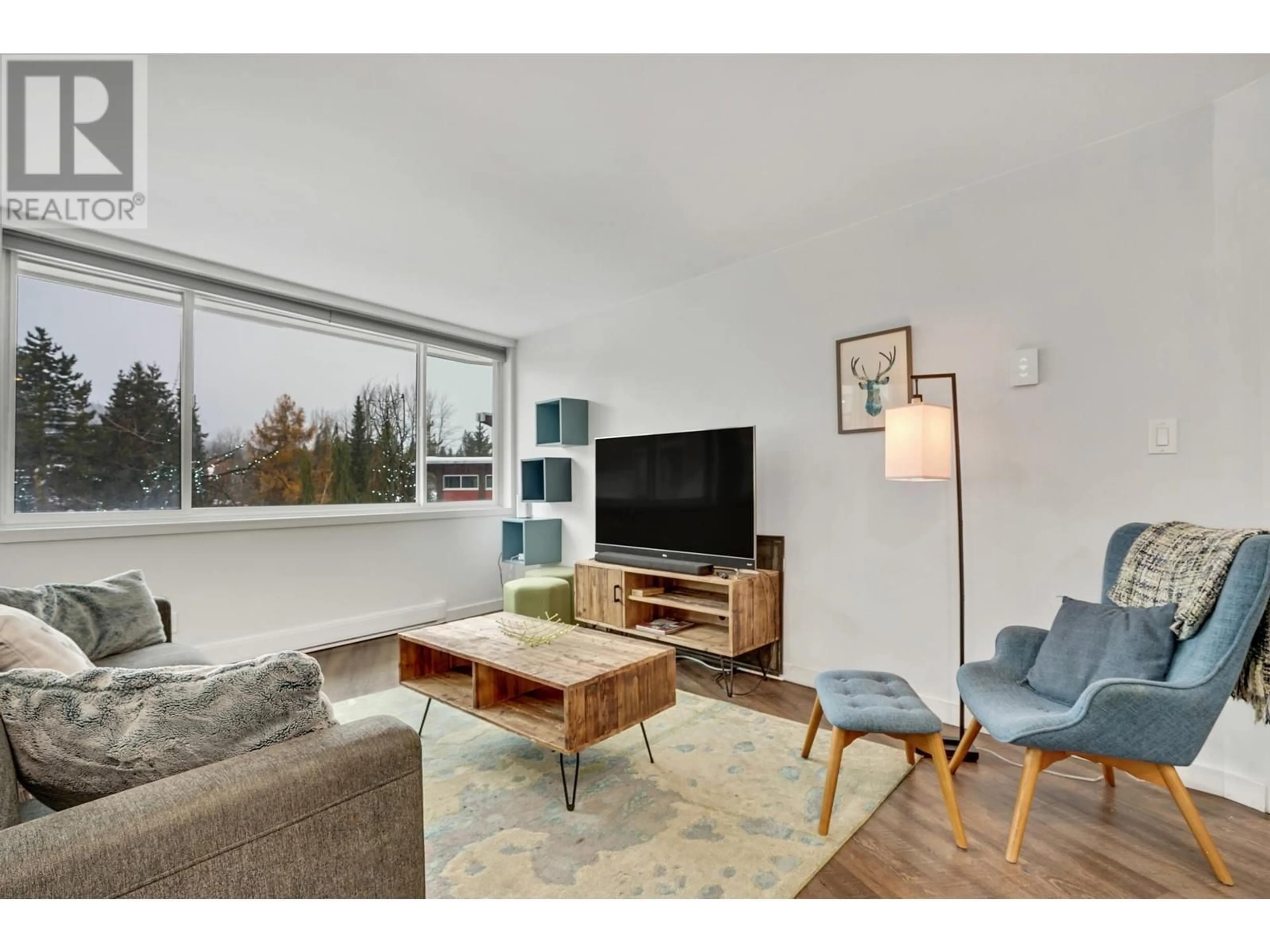 Living room with furniture, unknown for 202 - 4111 GOLFERS APPROACH, Whistler British Columbia V8E1A4