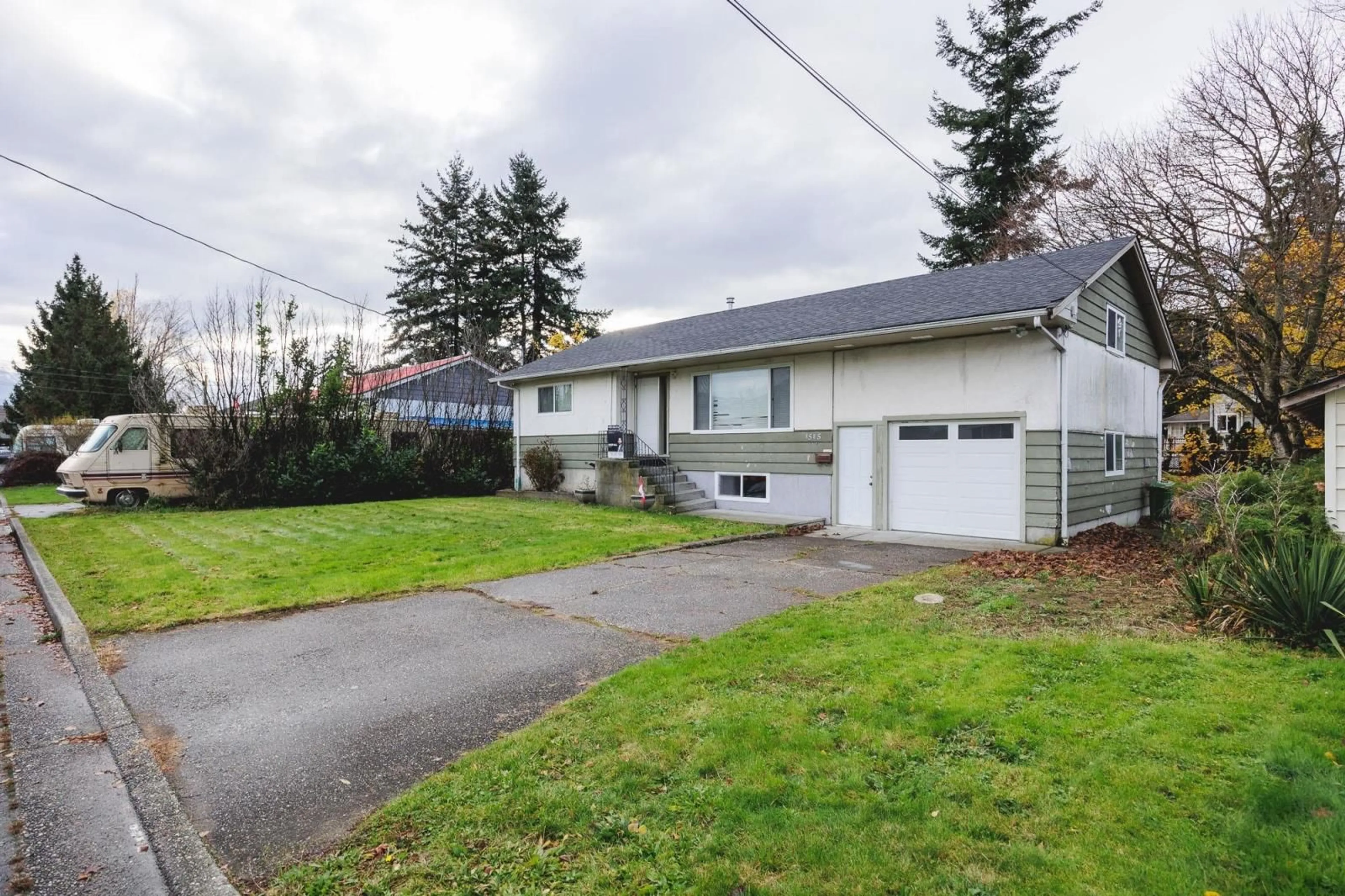 Frontside or backside of a home, the fenced backyard for 8585 HOWARD CRESCENT, Chilliwack British Columbia V2P5R5