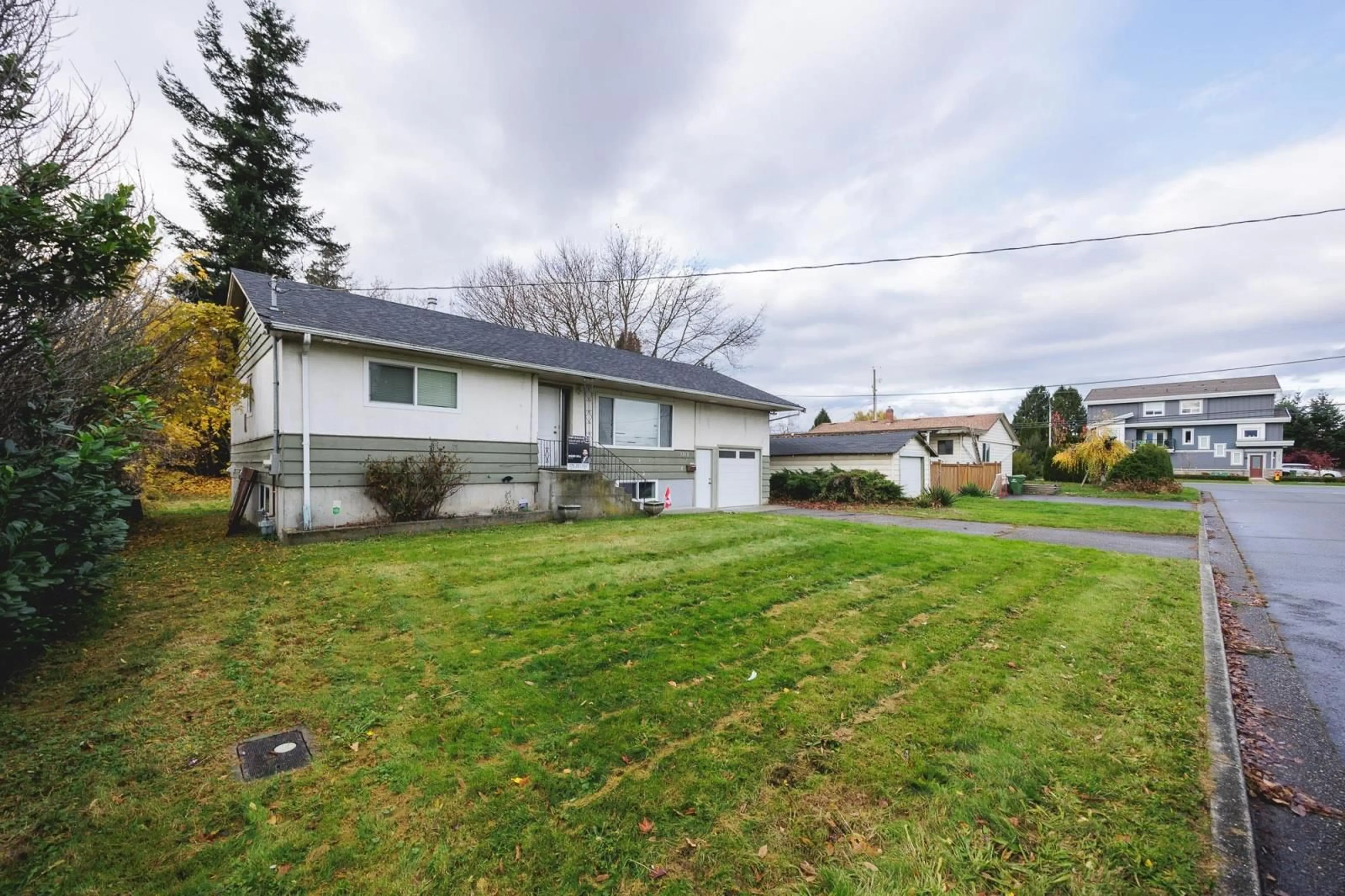 Frontside or backside of a home, the fenced backyard for 8585 HOWARD CRESCENT, Chilliwack British Columbia V2P5R5