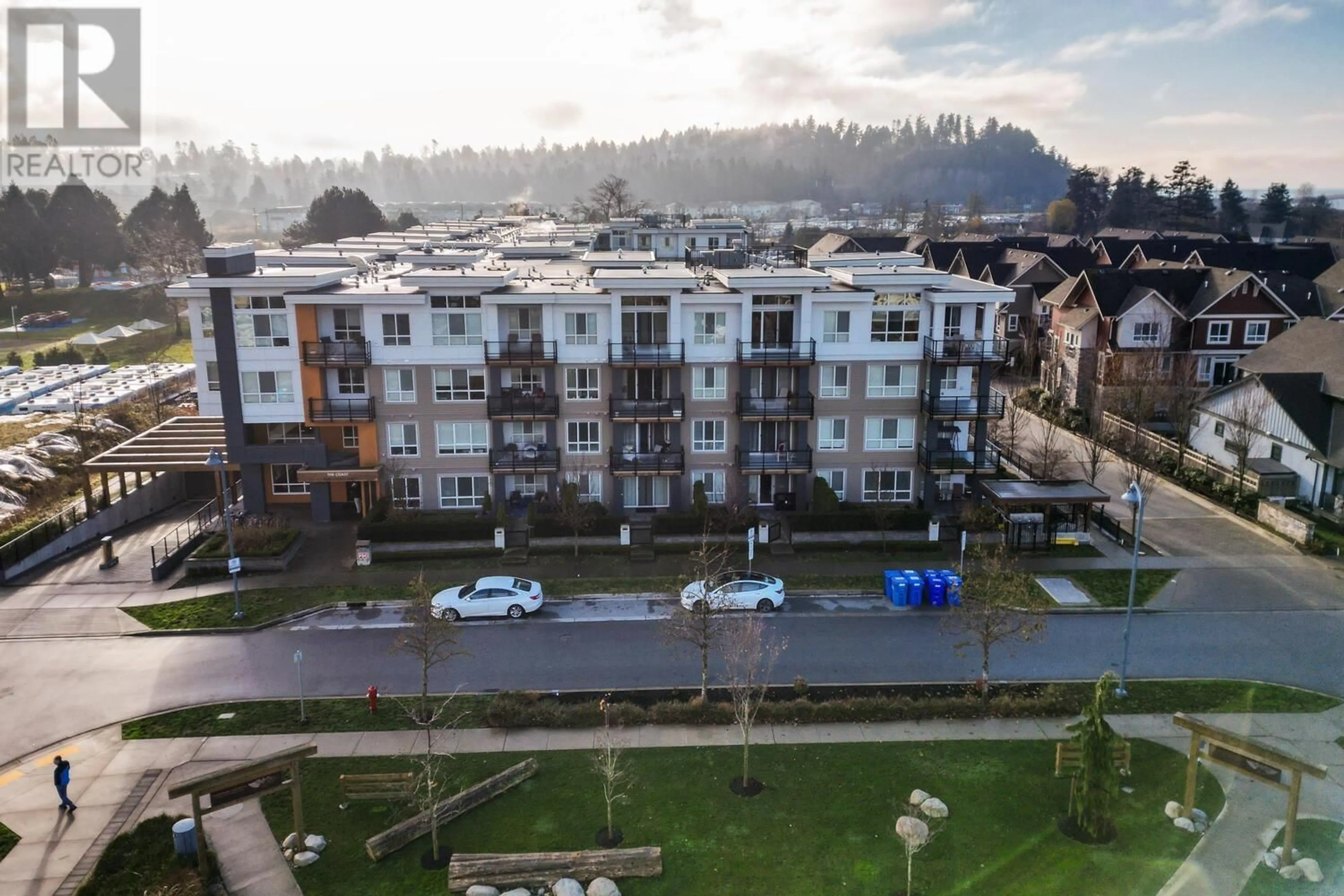 A pic from outside/outdoor area/front of a property/back of a property/a pic from drone, city buildings view from balcony for 328 - 4690 HAWK LANE, Delta British Columbia V4M0C4