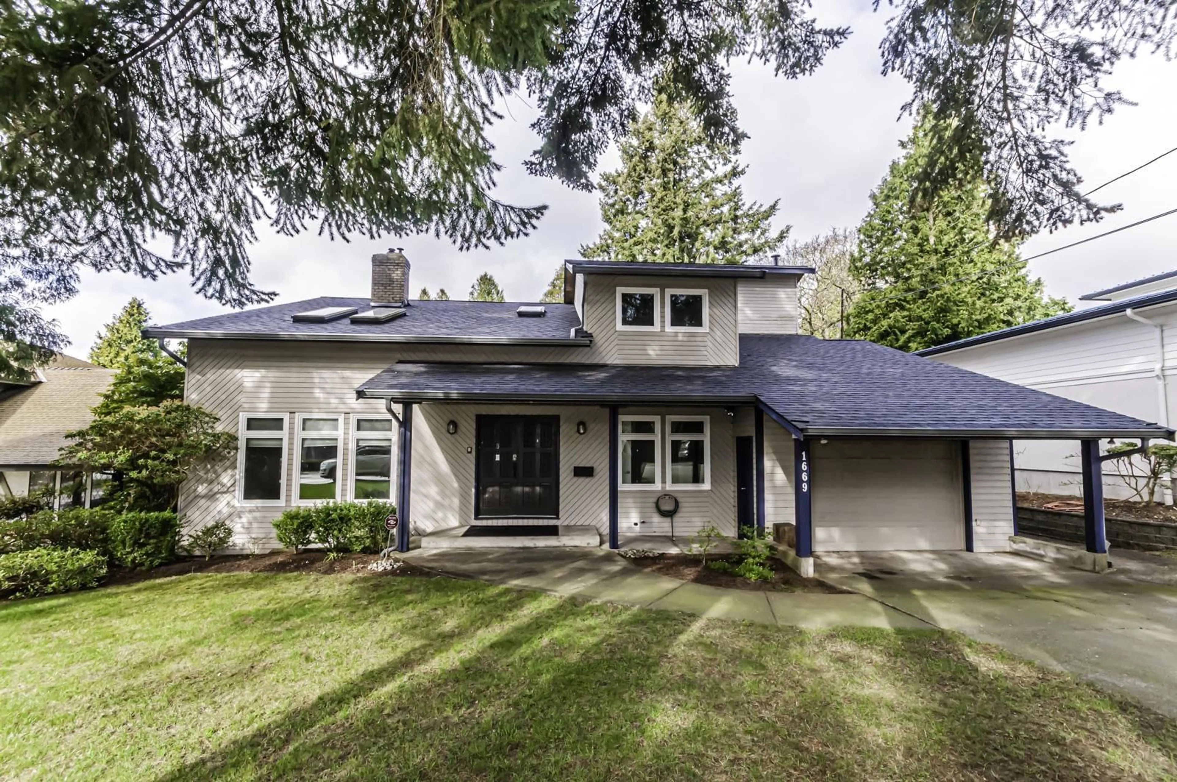 Frontside or backside of a home, cottage for 1669 146 STREET, Surrey British Columbia V4A5S4