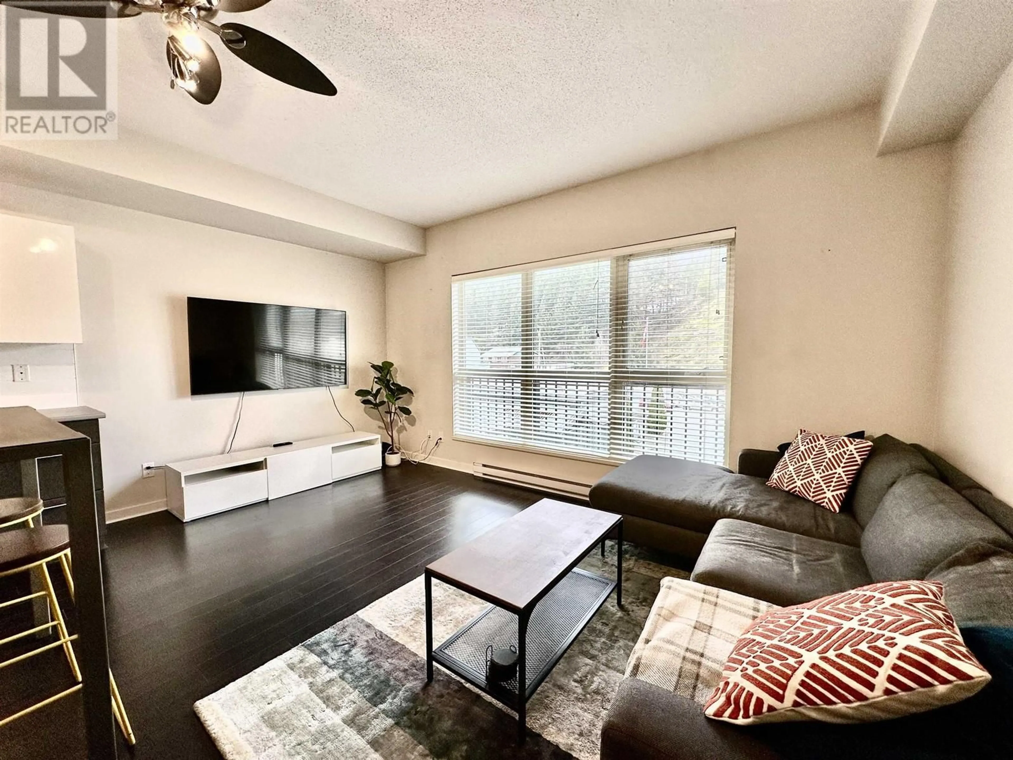 Living room, wood floors for 304 7445 FRONTIER STREET, Pemberton British Columbia V0N2L2