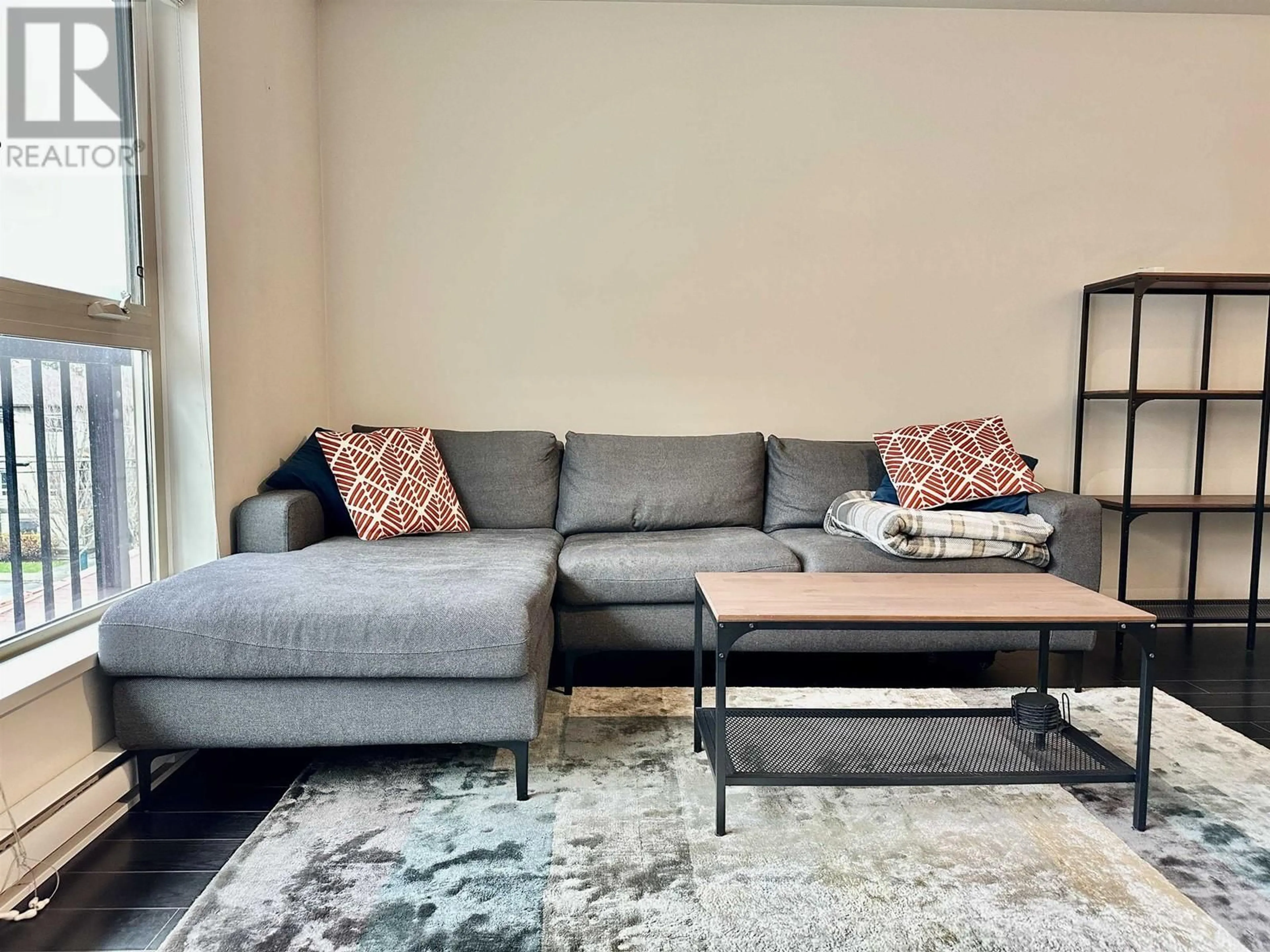 Living room, carpet floors for 304 7445 FRONTIER STREET, Pemberton British Columbia V0N2L2