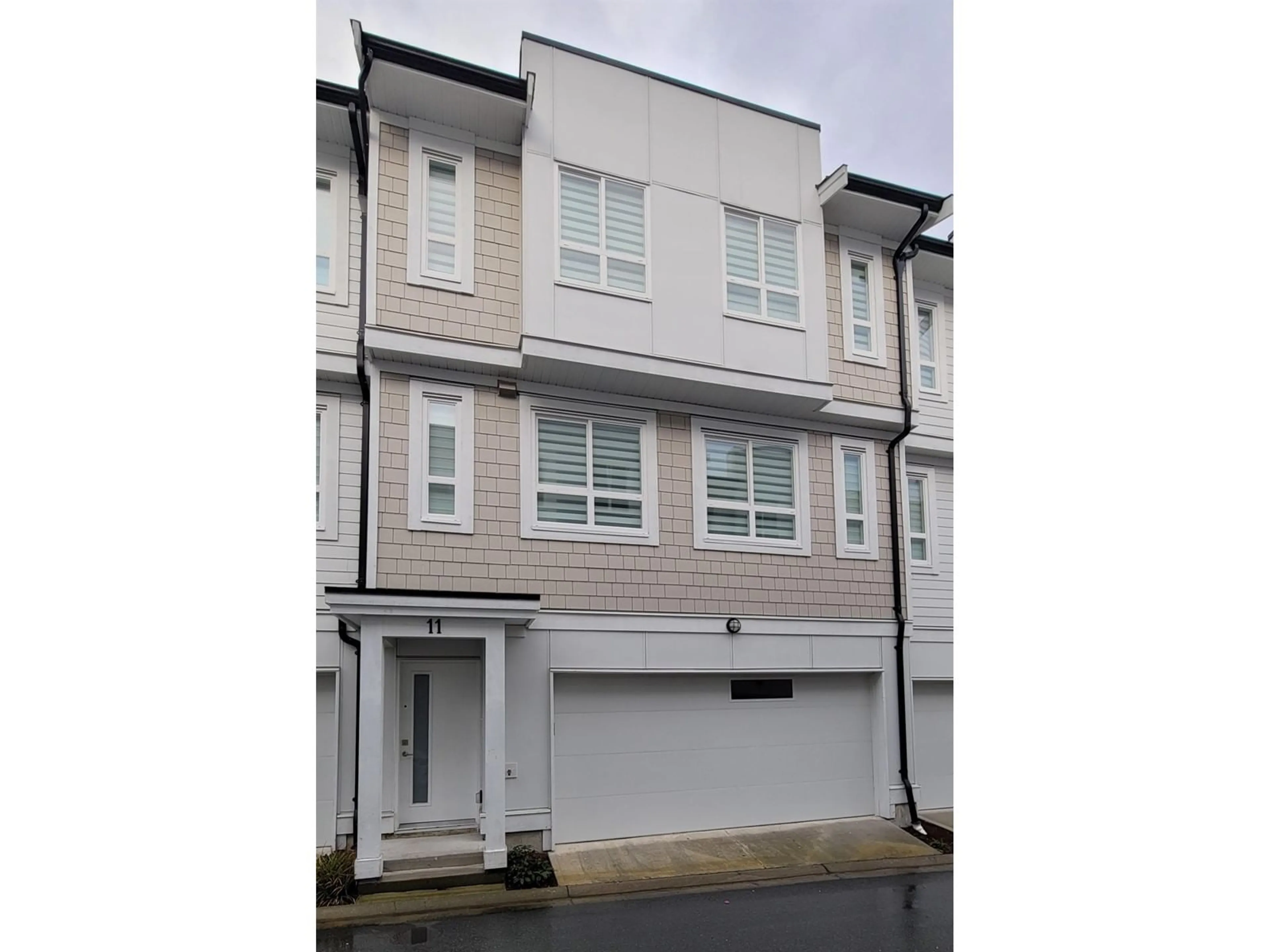 A pic from exterior of the house or condo, the street view for 11 8181 135A STREET, Surrey British Columbia V3W3N8