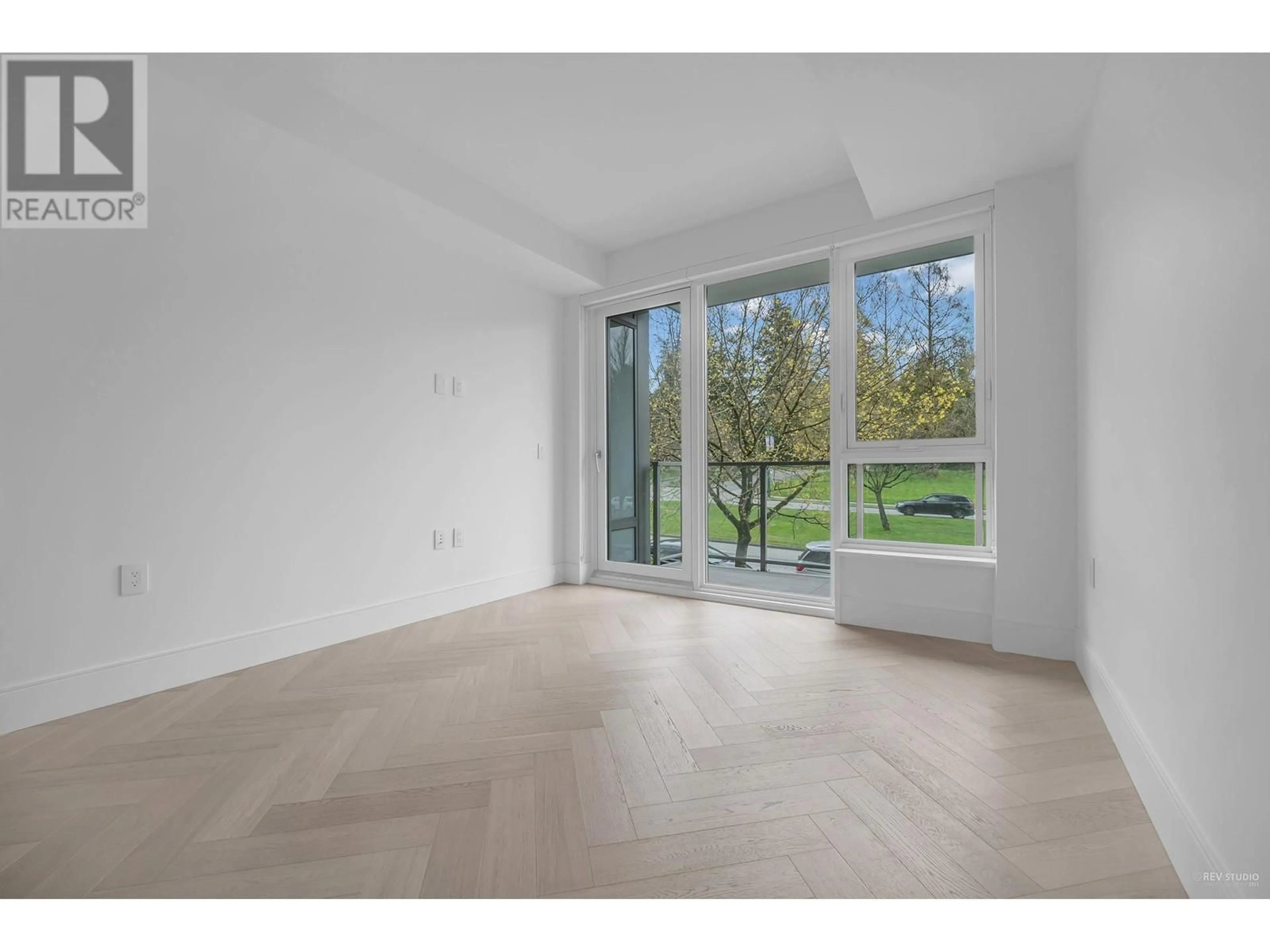 A pic of a room, wood floors for 206 4675 CAMBIE STREET, Vancouver British Columbia V5Z0J7