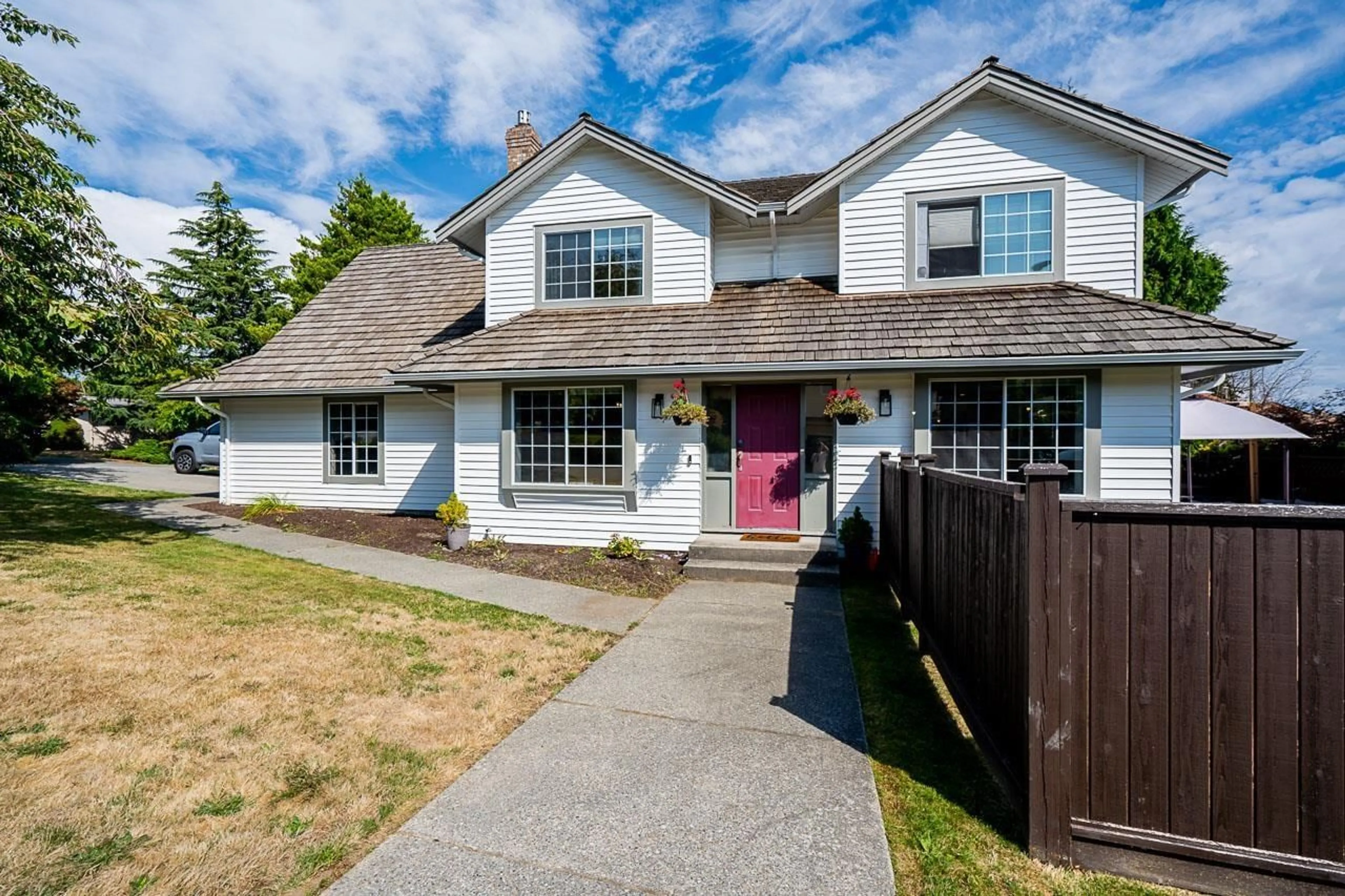 Frontside or backside of a home, the fenced backyard for 15578 ROPER AVENUE, White Rock British Columbia V4B2G5