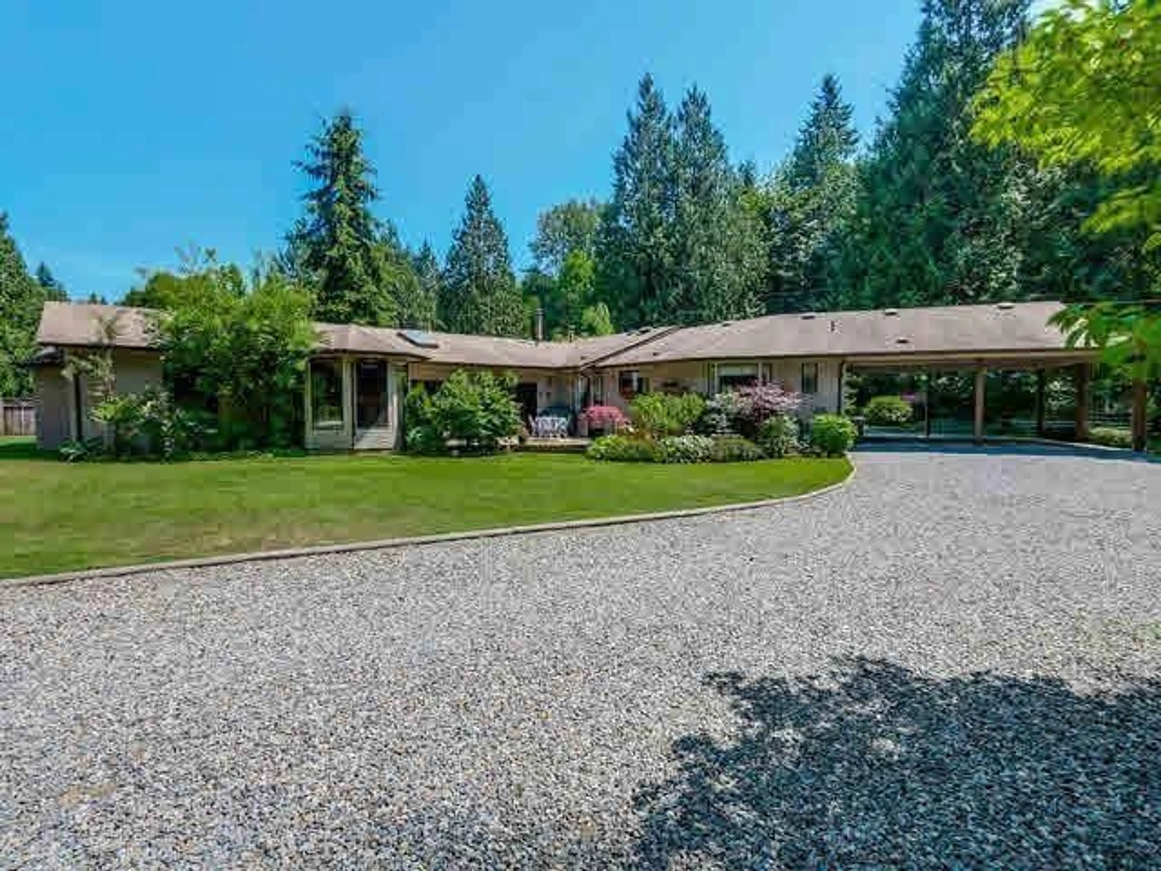 Frontside or backside of a home, the fenced backyard for 20515 20 AVENUE, Langley British Columbia V2Z2A3