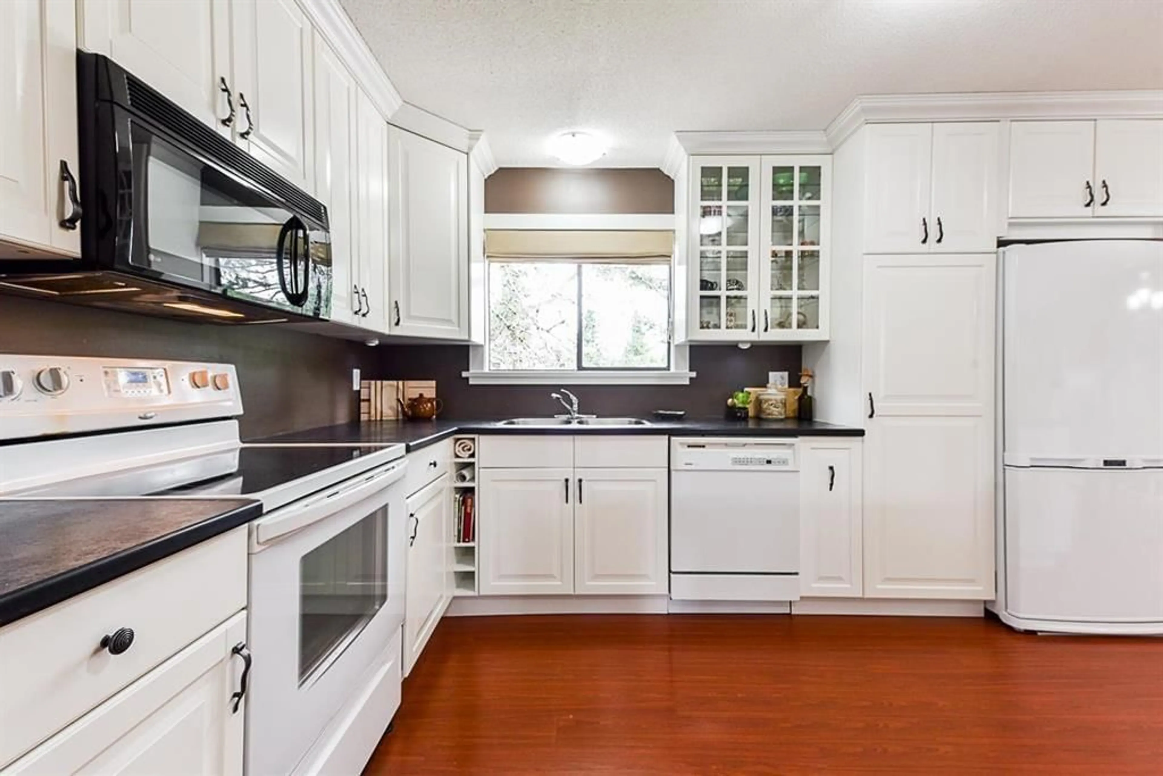 Standard kitchen, wood floors, cottage for 13070 PEKIN PLACE, Surrey British Columbia V3T1E5