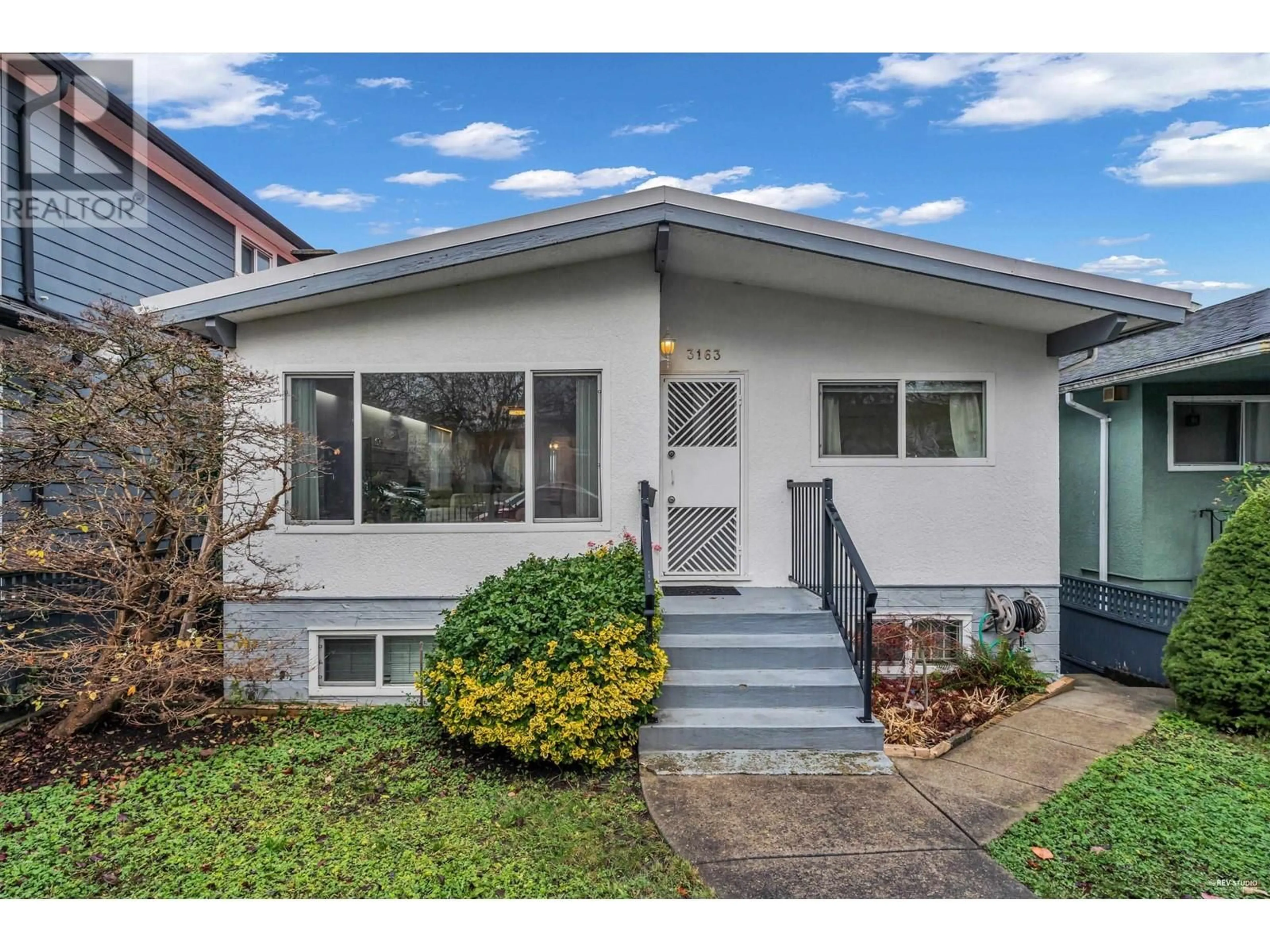 Frontside or backside of a home for 3163 E 16TH AVENUE, Vancouver British Columbia V5M2M7