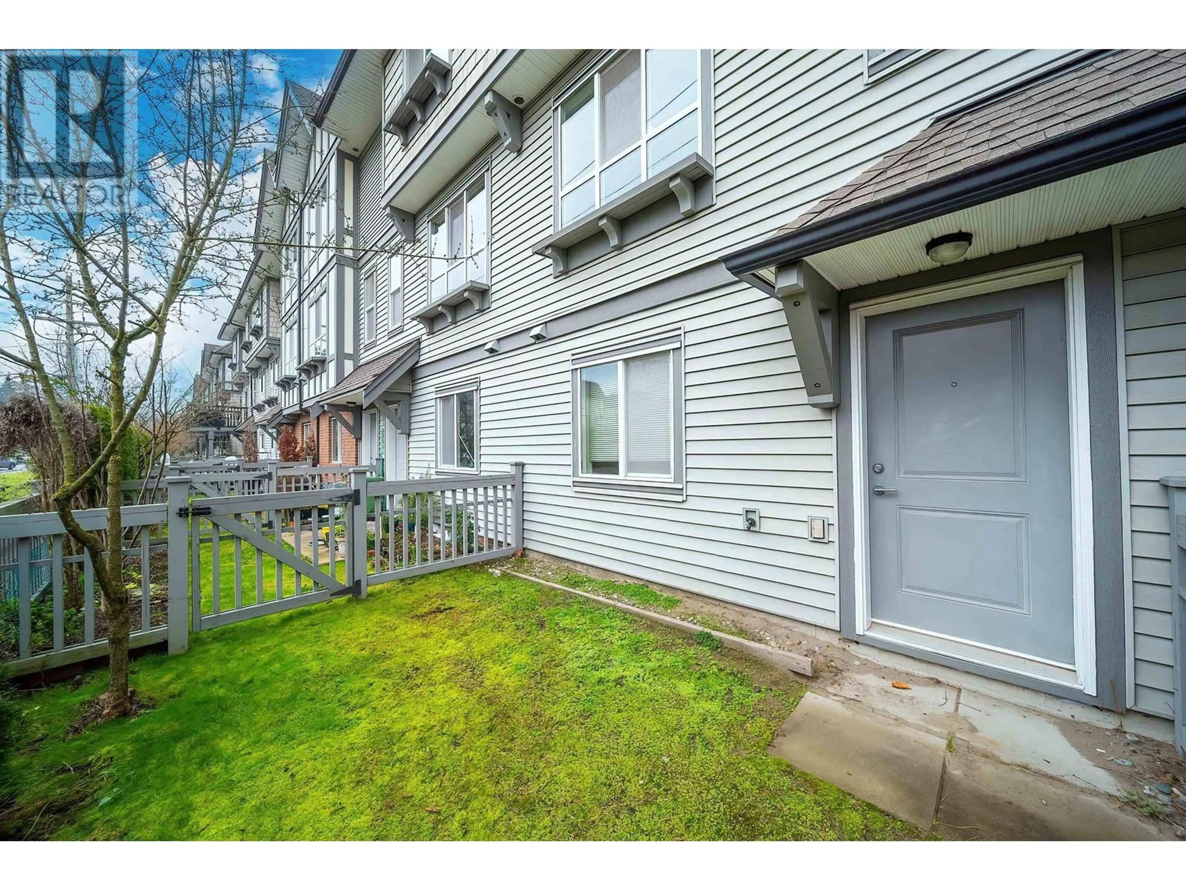 A pic from exterior of the house or condo, the fenced backyard for 65 9566 TOMICKI AVENUE, Richmond British Columbia V6X0E6