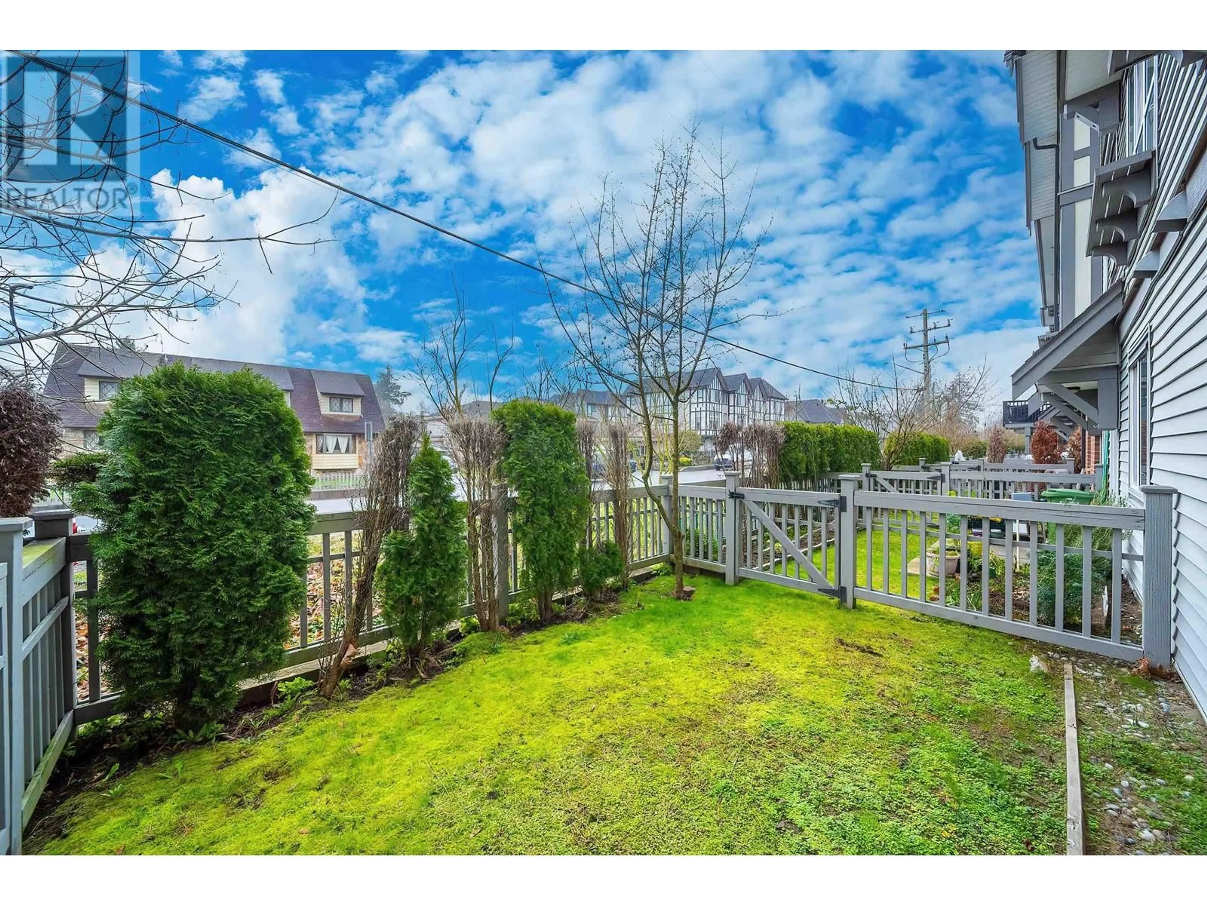 A pic from exterior of the house or condo, the fenced backyard for 65 9566 TOMICKI AVENUE, Richmond British Columbia V6X0E6