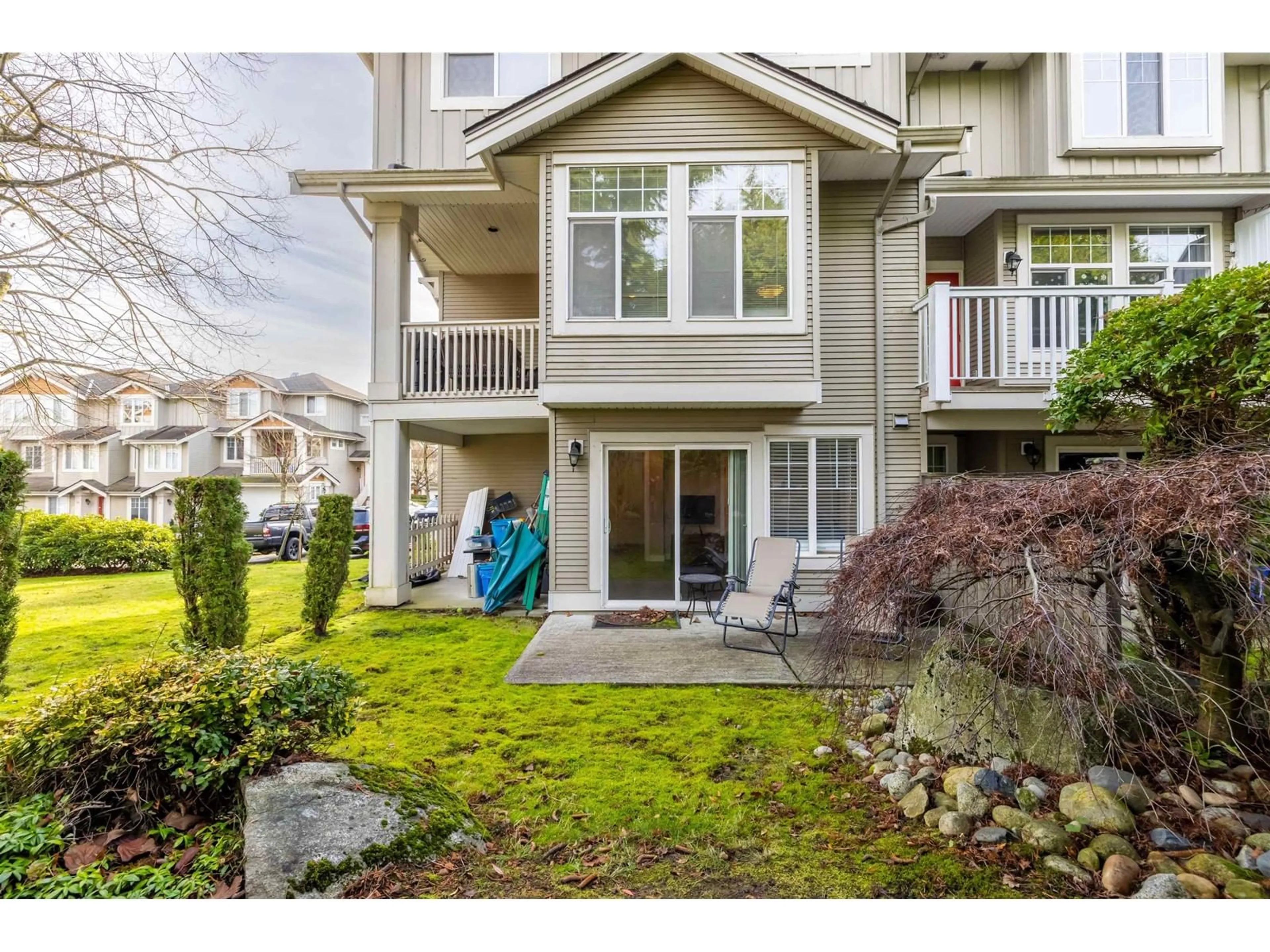 Frontside or backside of a home, the fenced backyard for 81 14877 58 AVENUE, Surrey British Columbia V3S8Y9