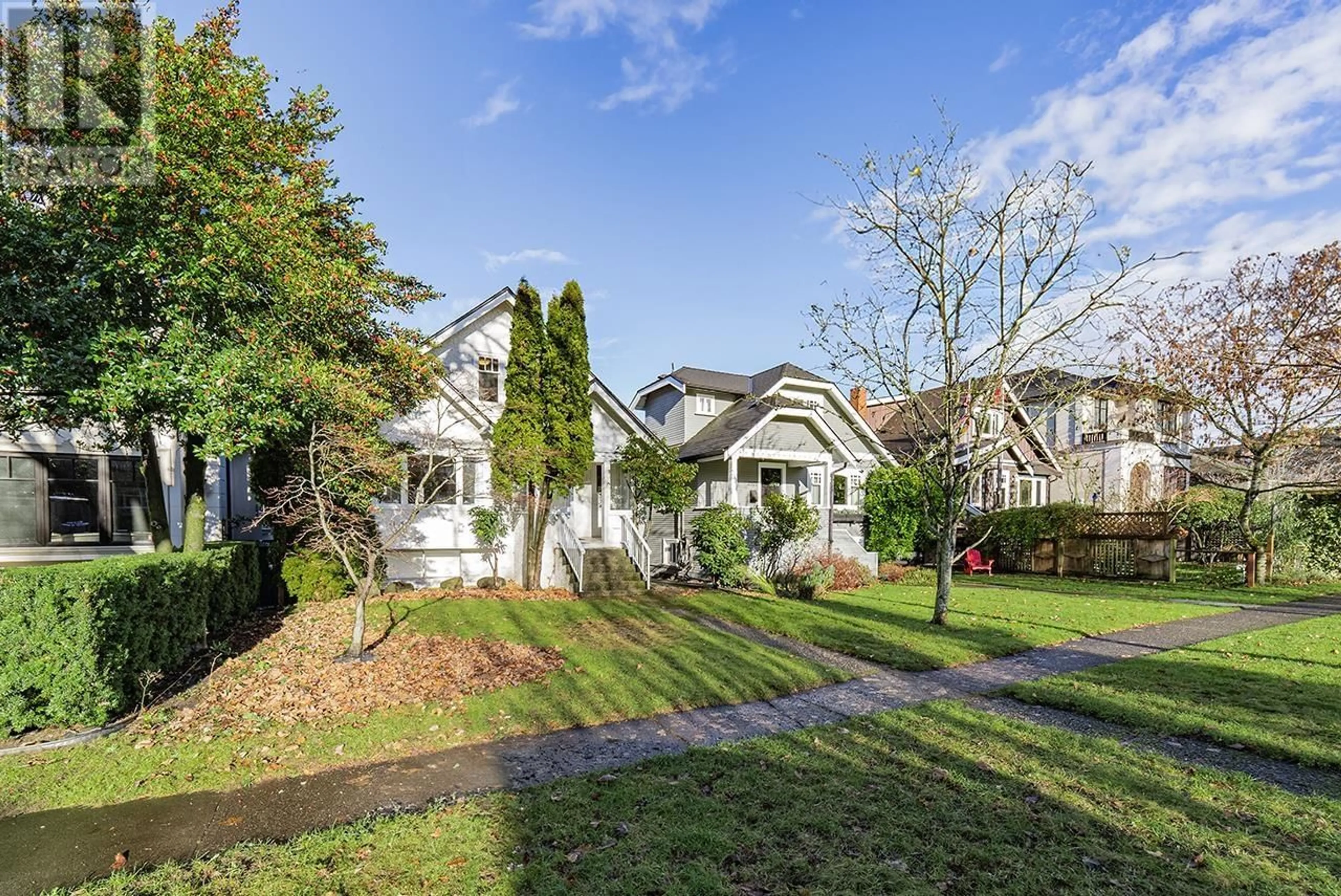 Frontside or backside of a home, the fenced backyard for 3873 22ND AVE W AVENUE, Vancouver British Columbia V6S1J8