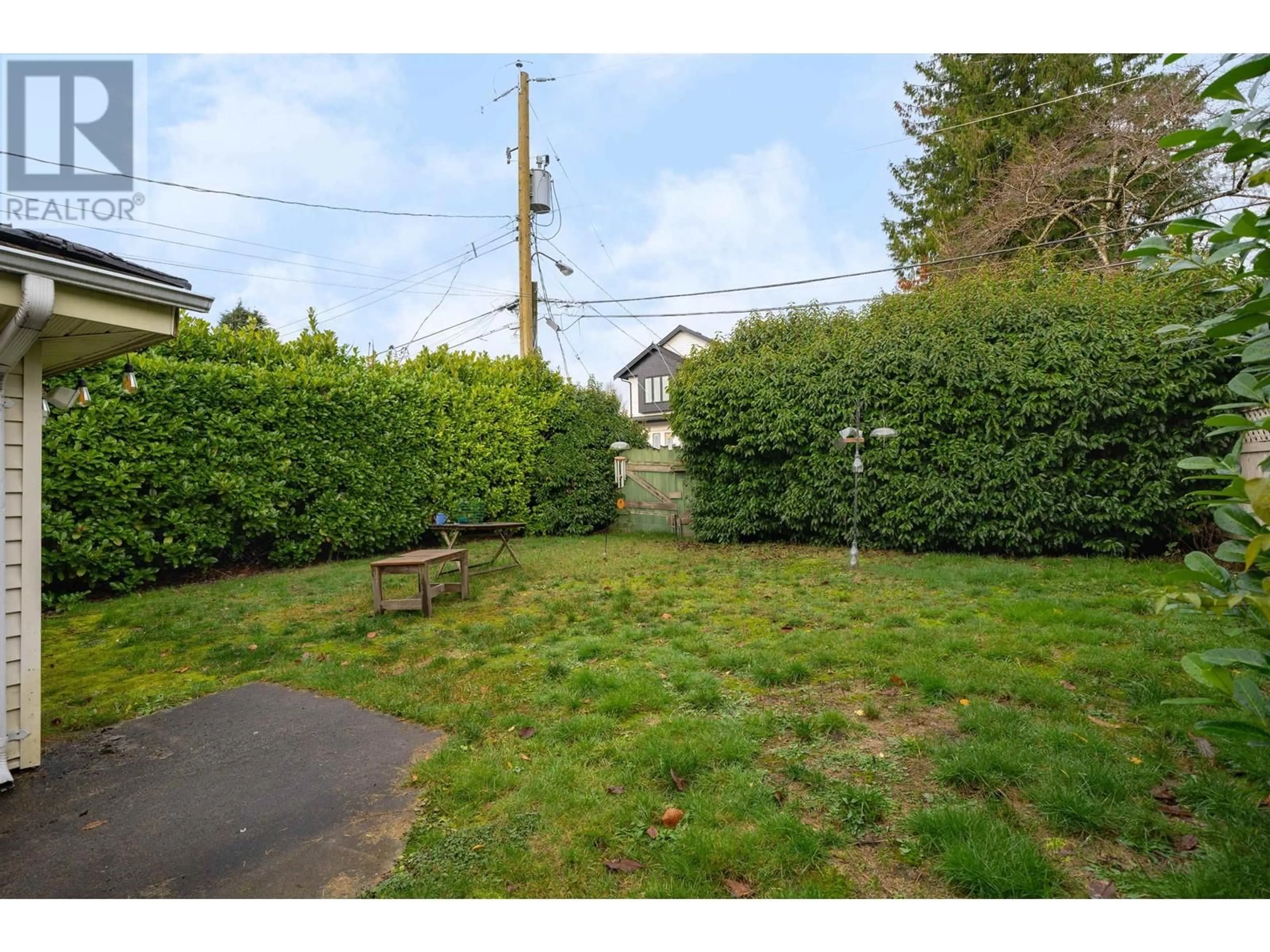 Patio, the fenced backyard for 2577 E 16TH AVENUE, Vancouver British Columbia V5M2L5