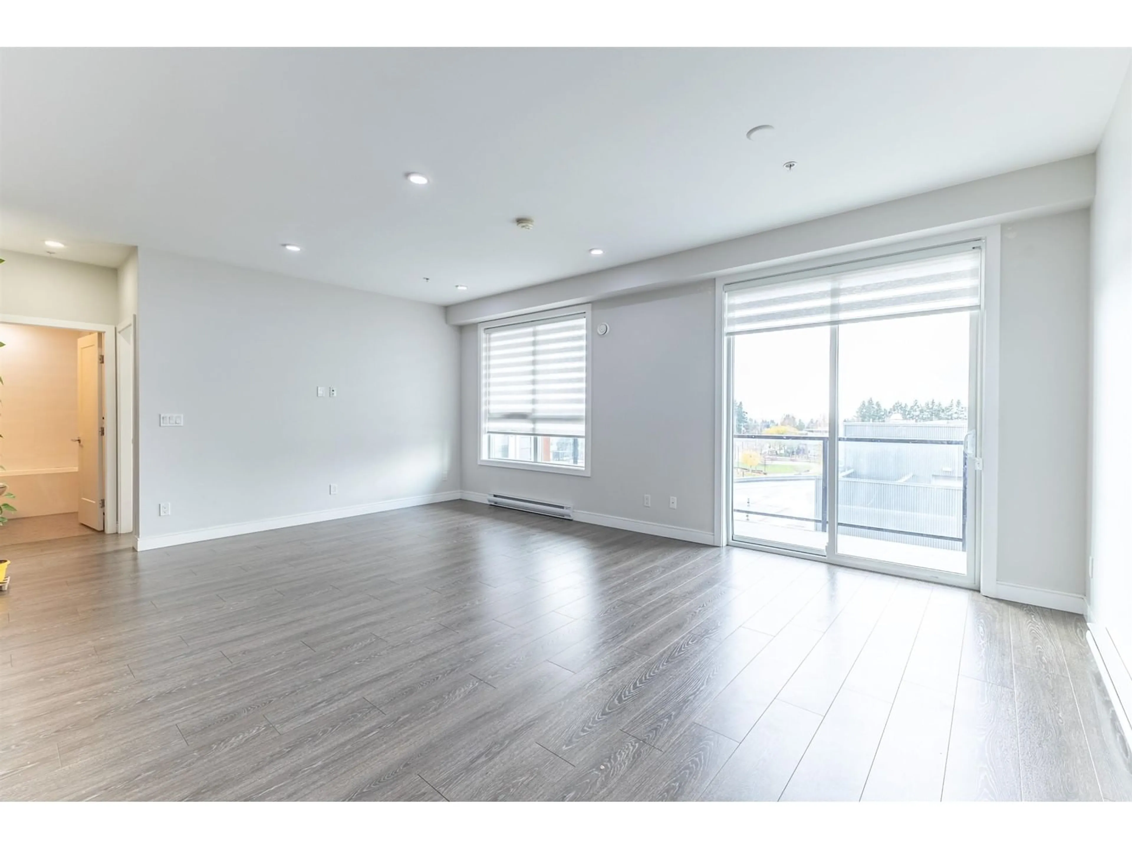 Other indoor space, wood floors for 406 11501 84 AVENUE, Delta British Columbia V4C0E5