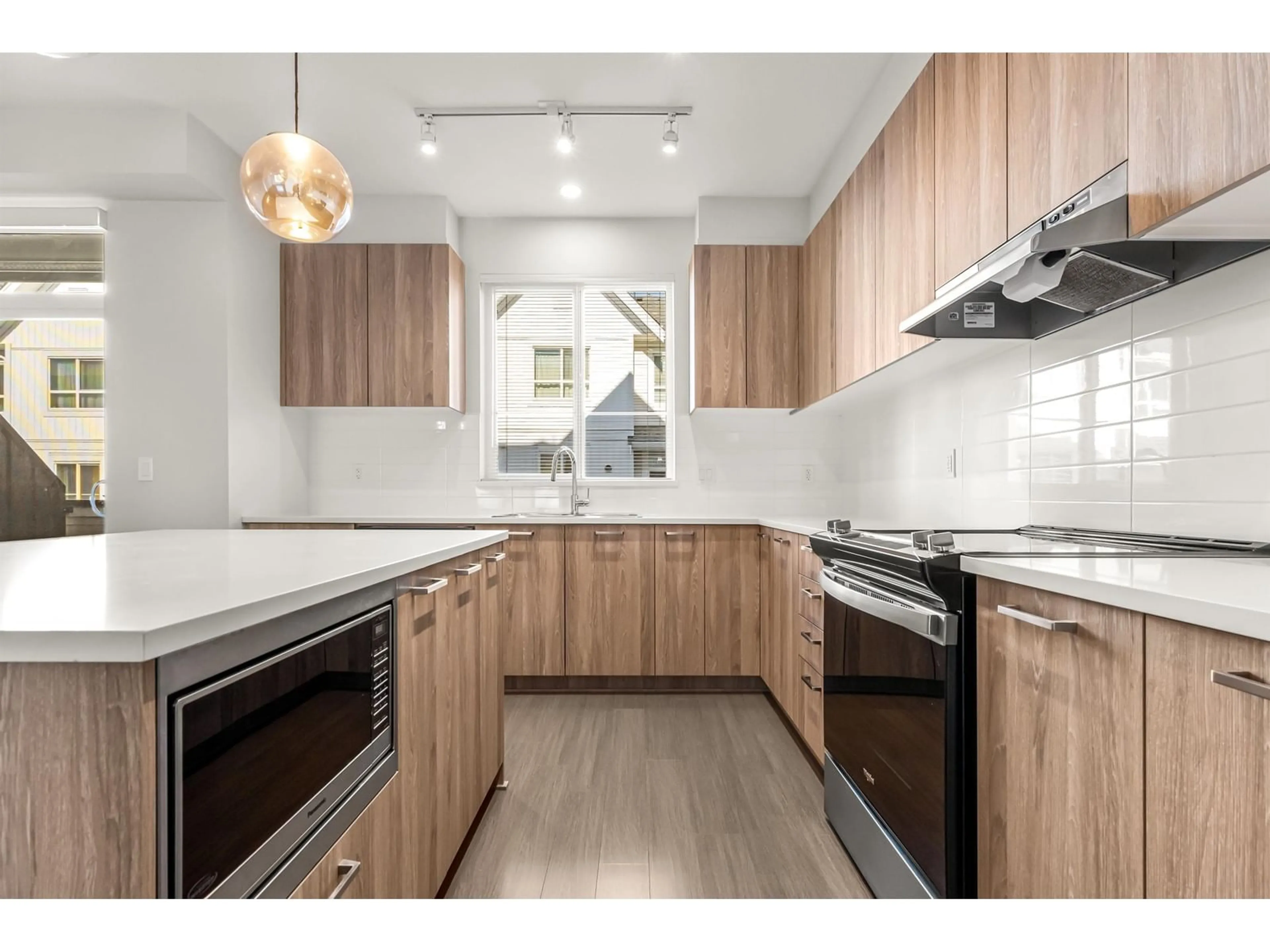 Standard kitchen, wood floors for 108 8335 NELSON STREET, Mission British Columbia V4S0E4