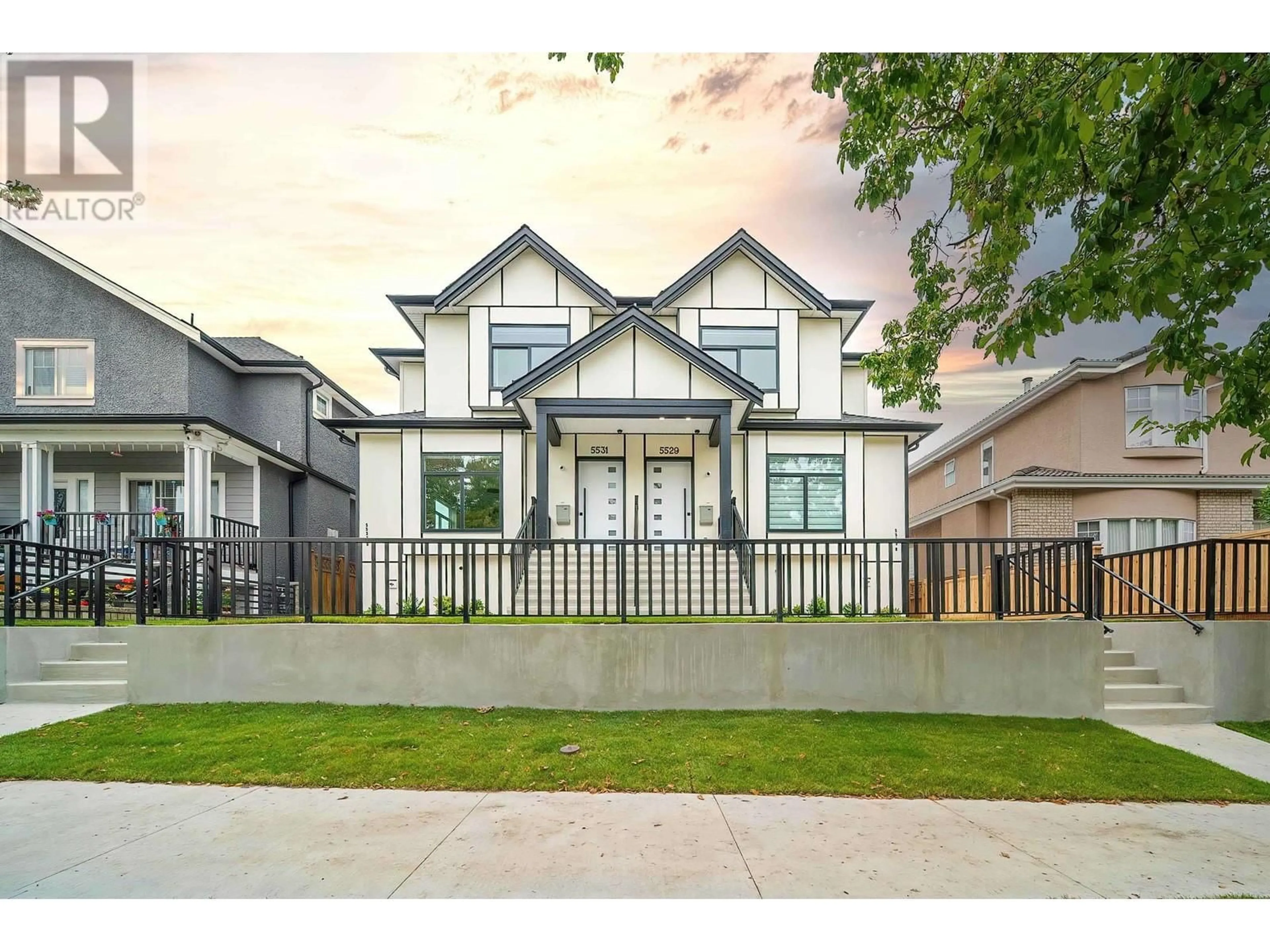 Frontside or backside of a home, the fenced backyard for 5531 SLOCAN STREET, Vancouver British Columbia V5R2A9