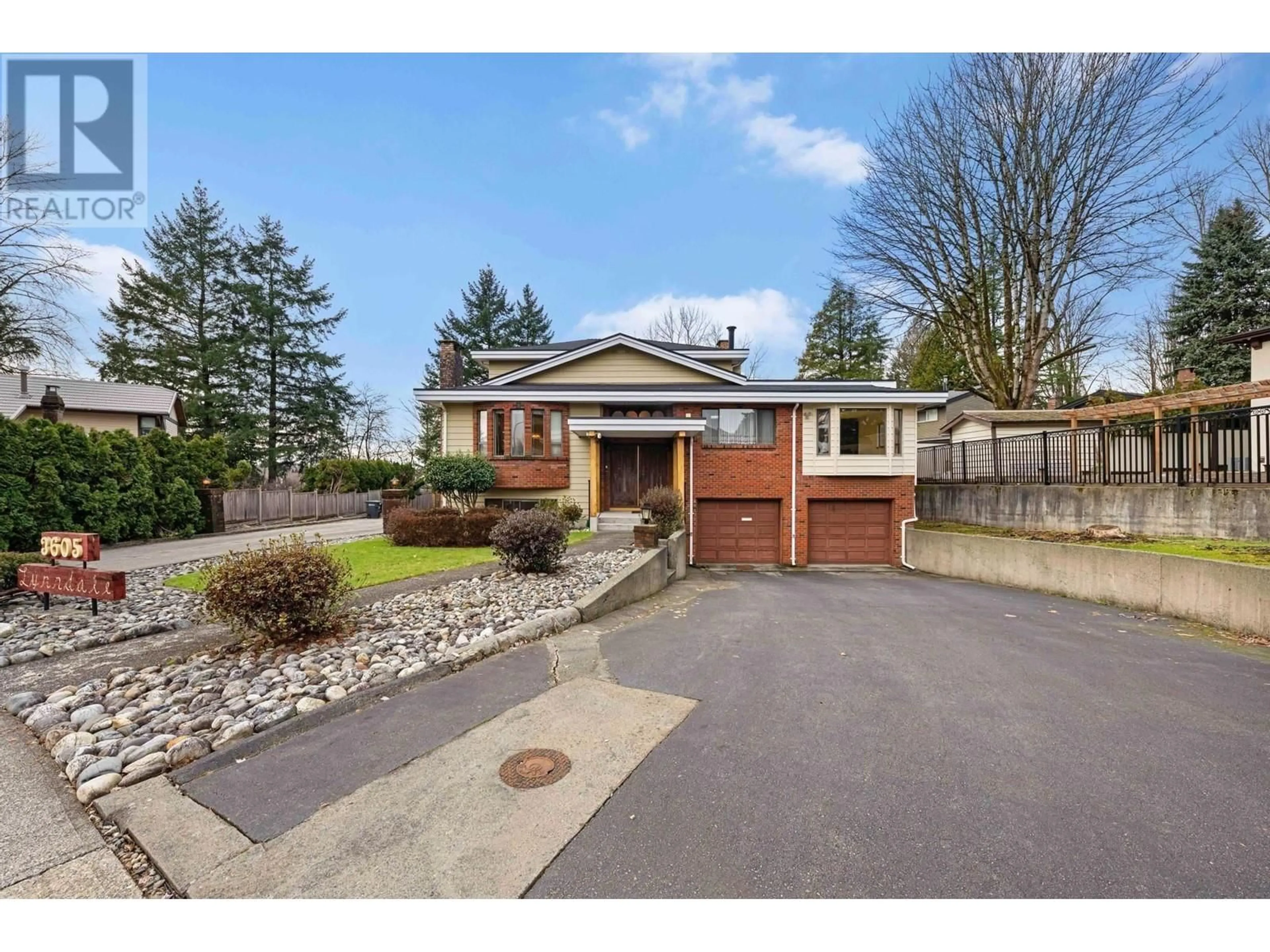 Frontside or backside of a home, the fenced backyard for 3605 LYNNDALE CRESCENT, Burnaby British Columbia V5A3S4