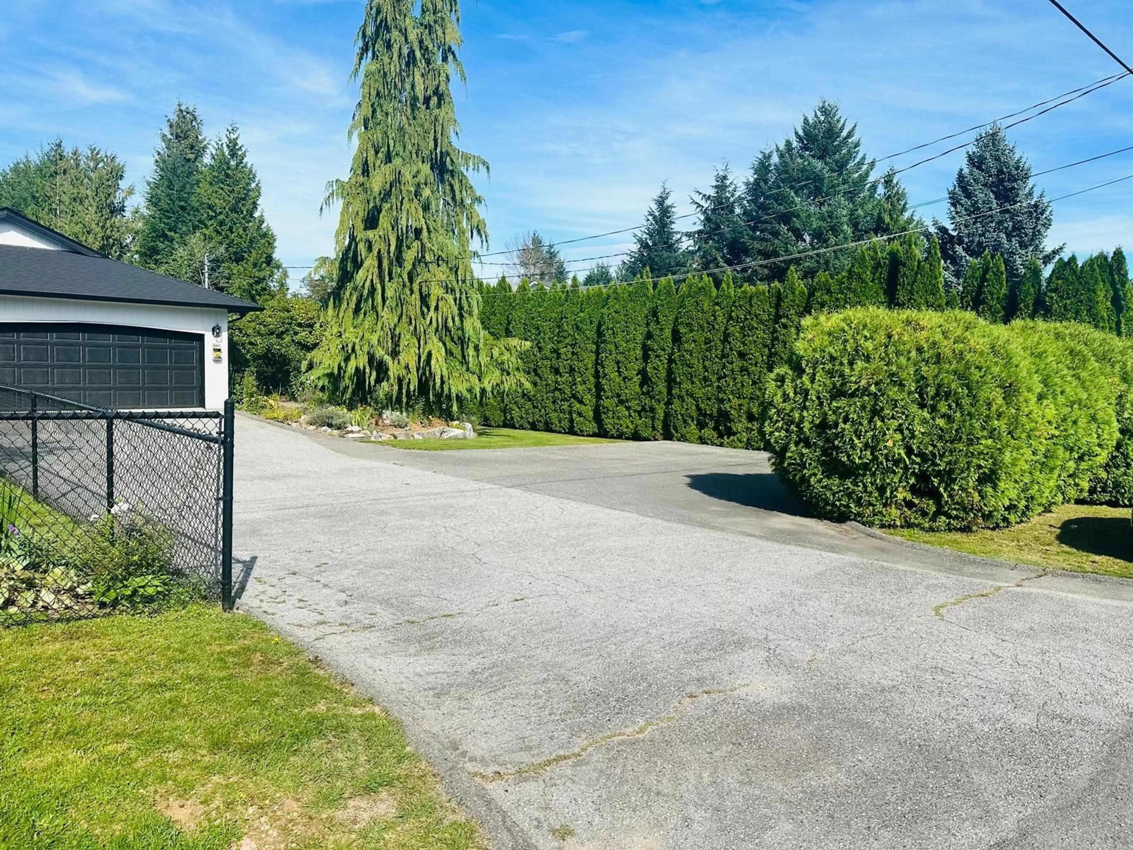 Frontside or backside of a home, the fenced backyard for 34085 YORK AVENUE, Mission British Columbia V2V6Y5