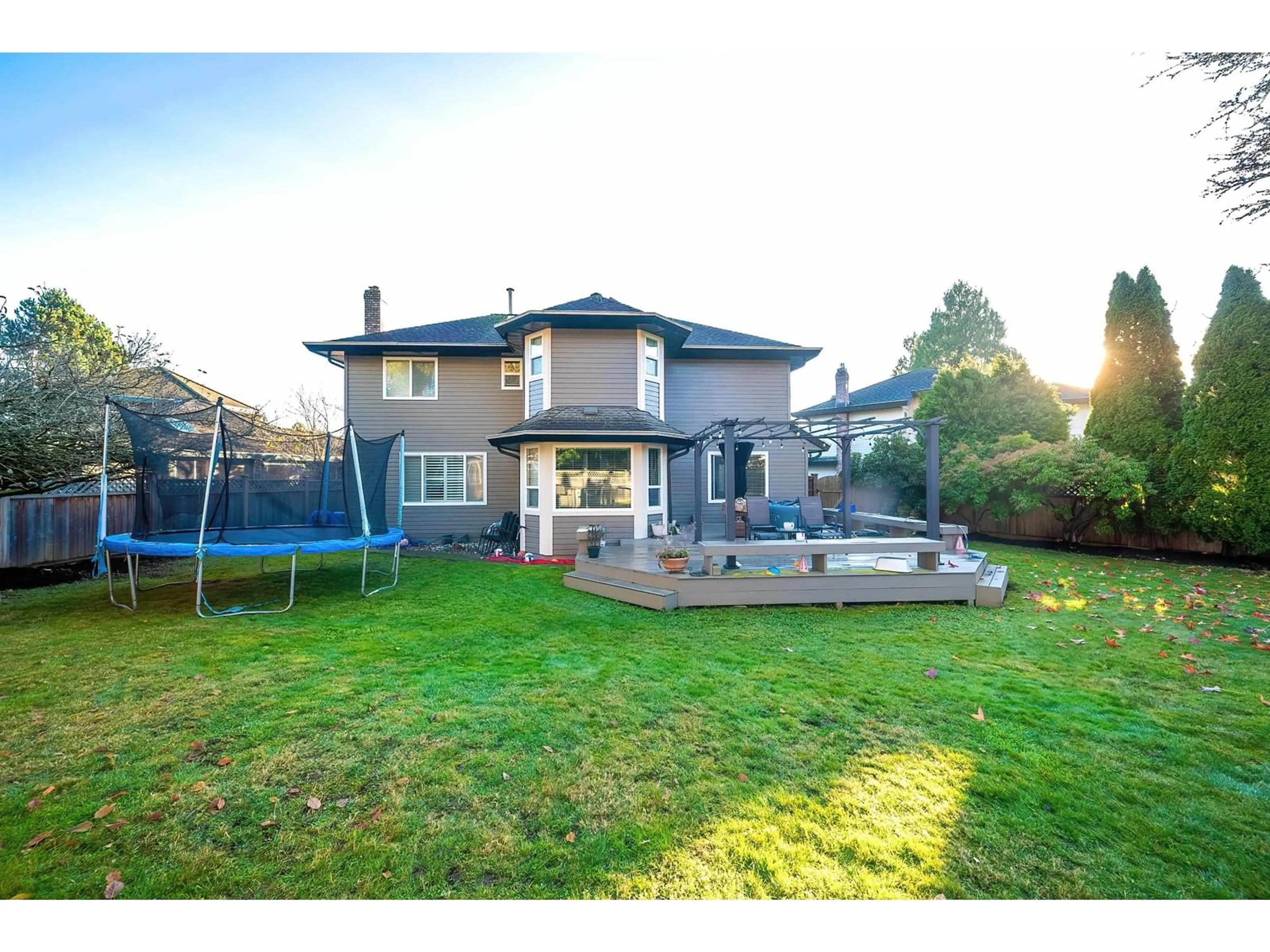 Frontside or backside of a home, the fenced backyard for 14816 20A AVENUE, Surrey British Columbia V4A8L3