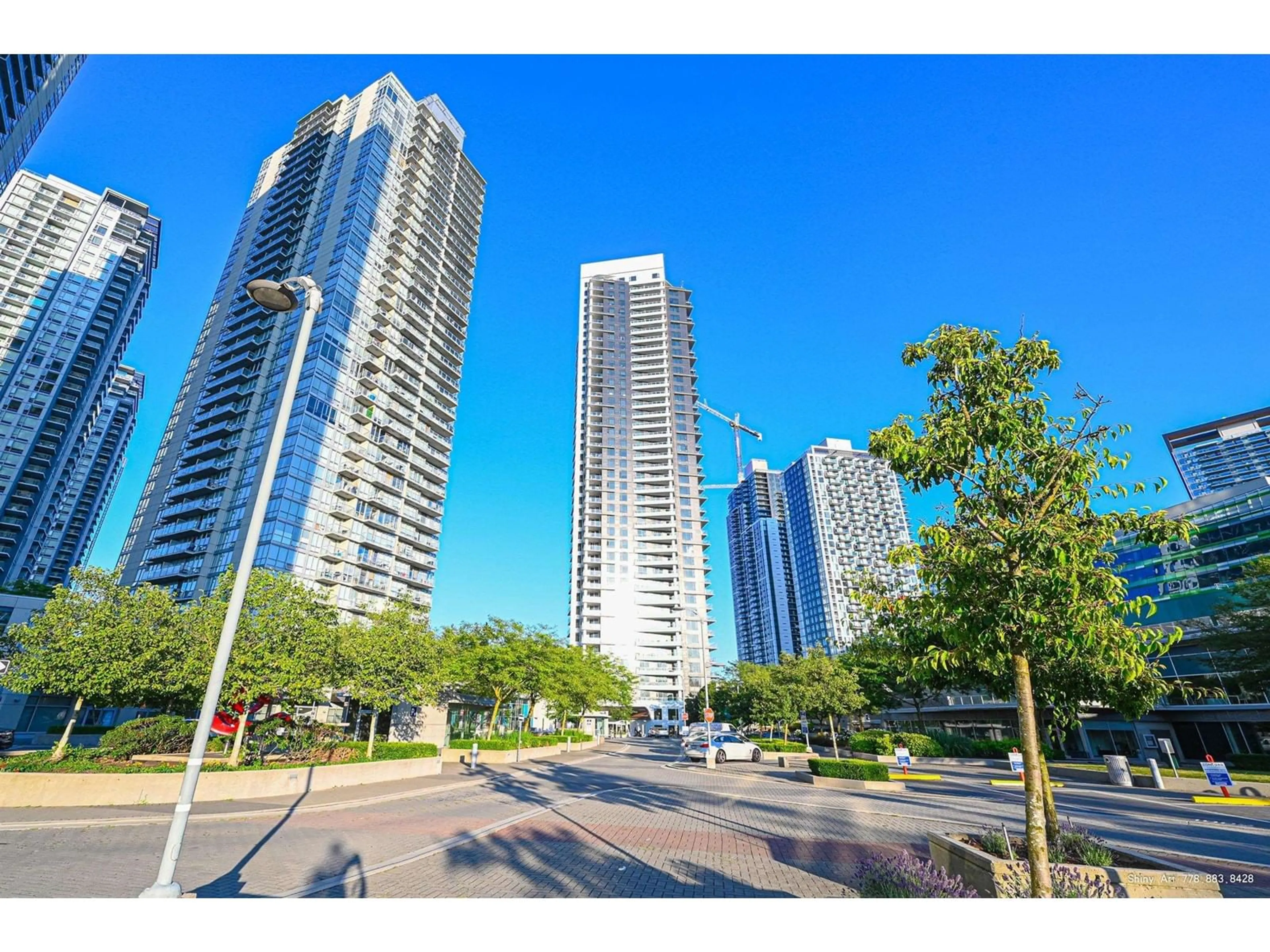 A pic from exterior of the house or condo, the view of city buildings for 409 9887 WHALLEY BOULEVARD, Surrey British Columbia V3T0P4