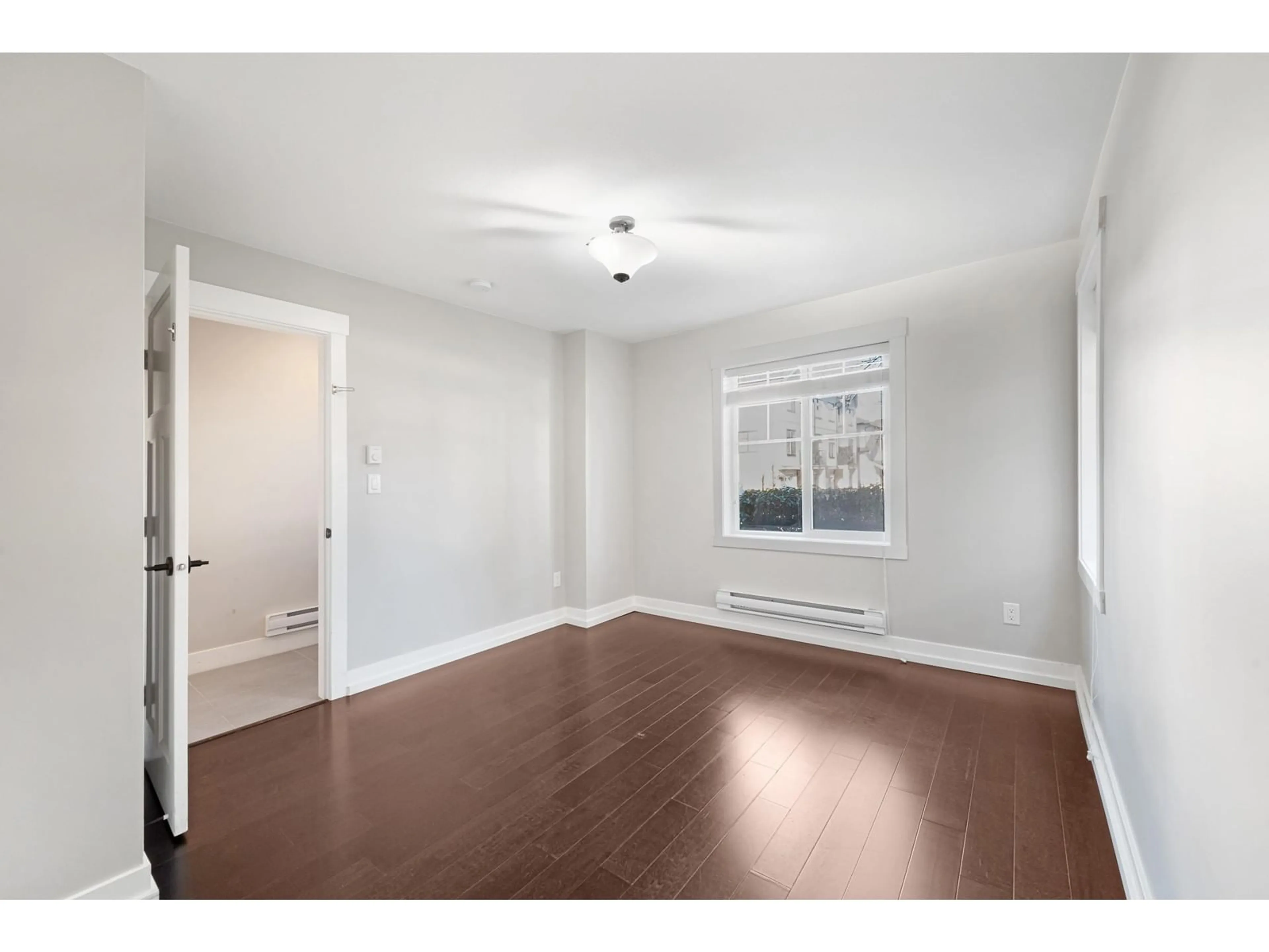 A pic of a room, wood floors for 10 16458 23A AVENUE, Surrey British Columbia V3Z0L9