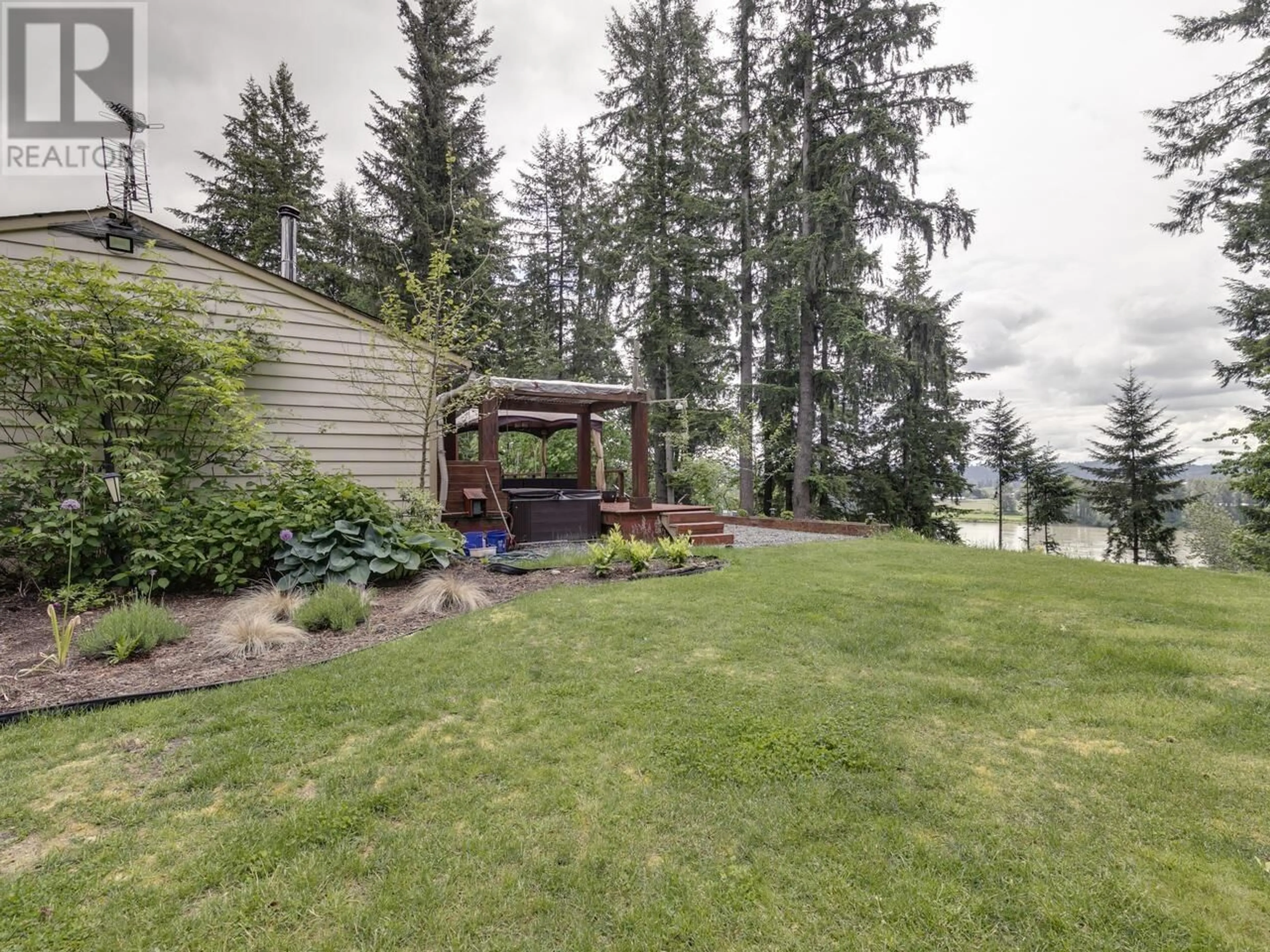 Patio, the fenced backyard for 26521 LOUGHEED HIGHWAY, Maple Ridge British Columbia V2W1K2