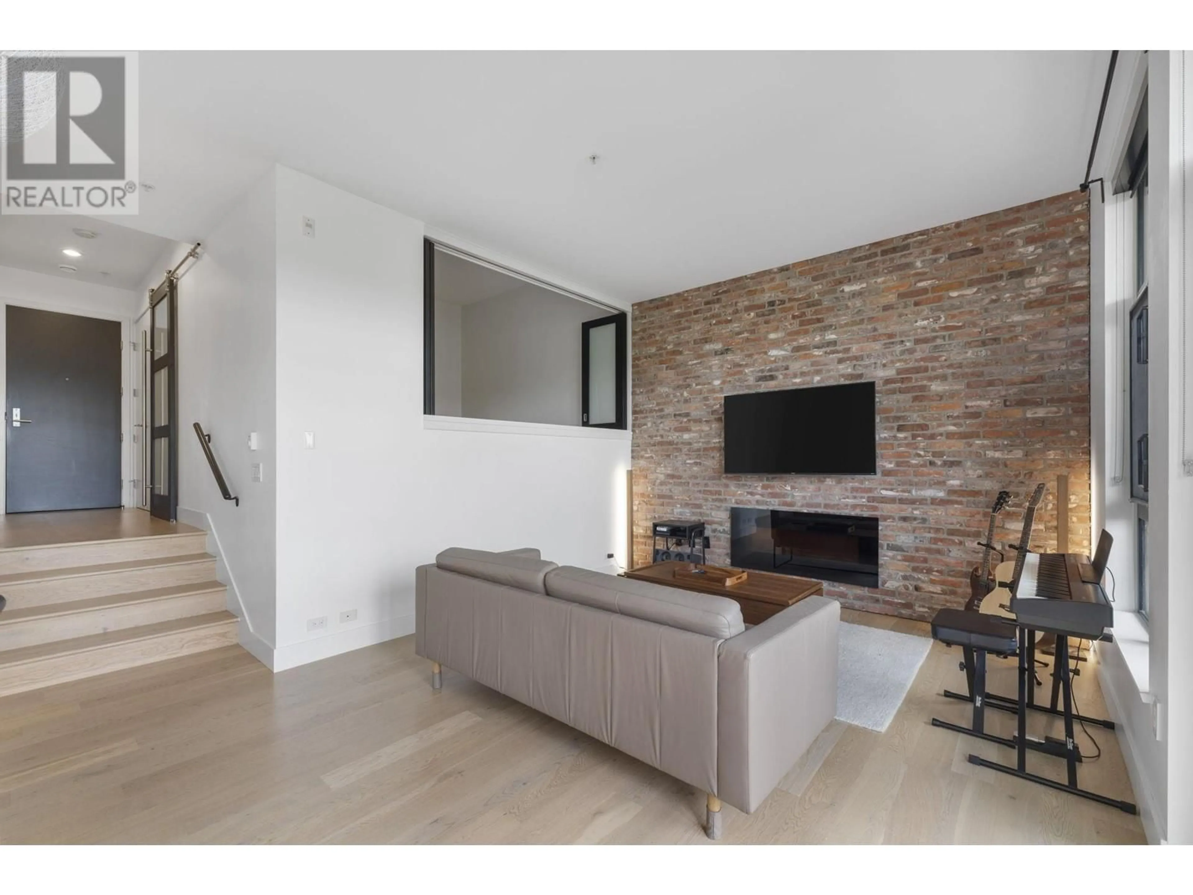 Living room, wood floors for 302 220 SALTER STREET, New Westminster British Columbia V3M0H4